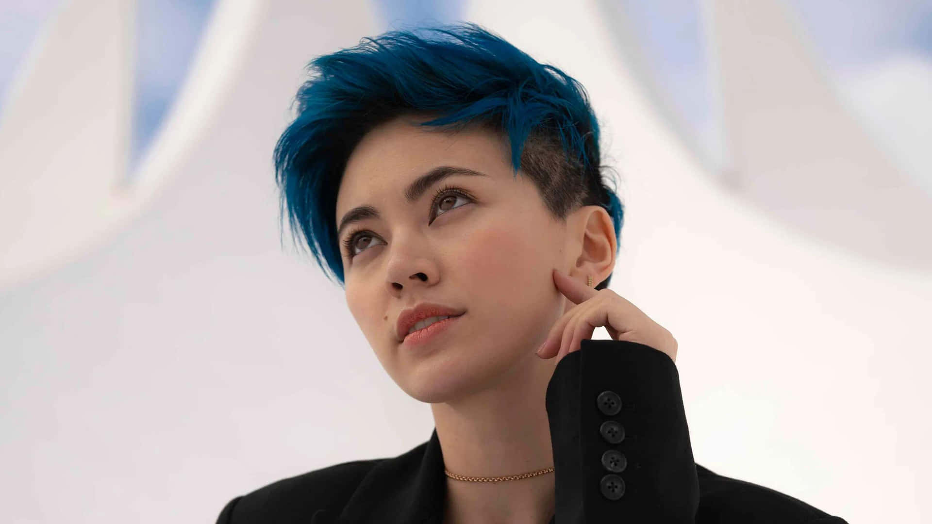 Womanwith Blue Hair Contemplative Look Wallpaper