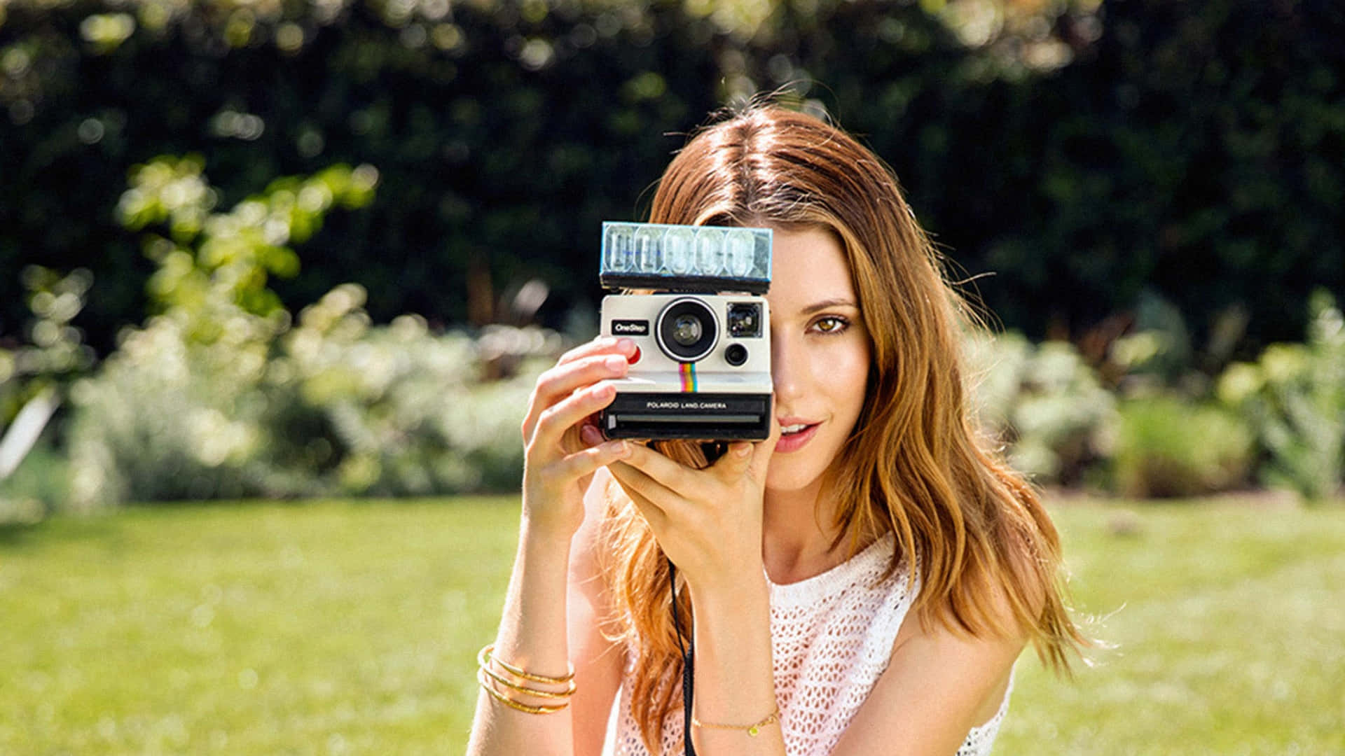 Womanwith Vintage Camera Outdoors Wallpaper
