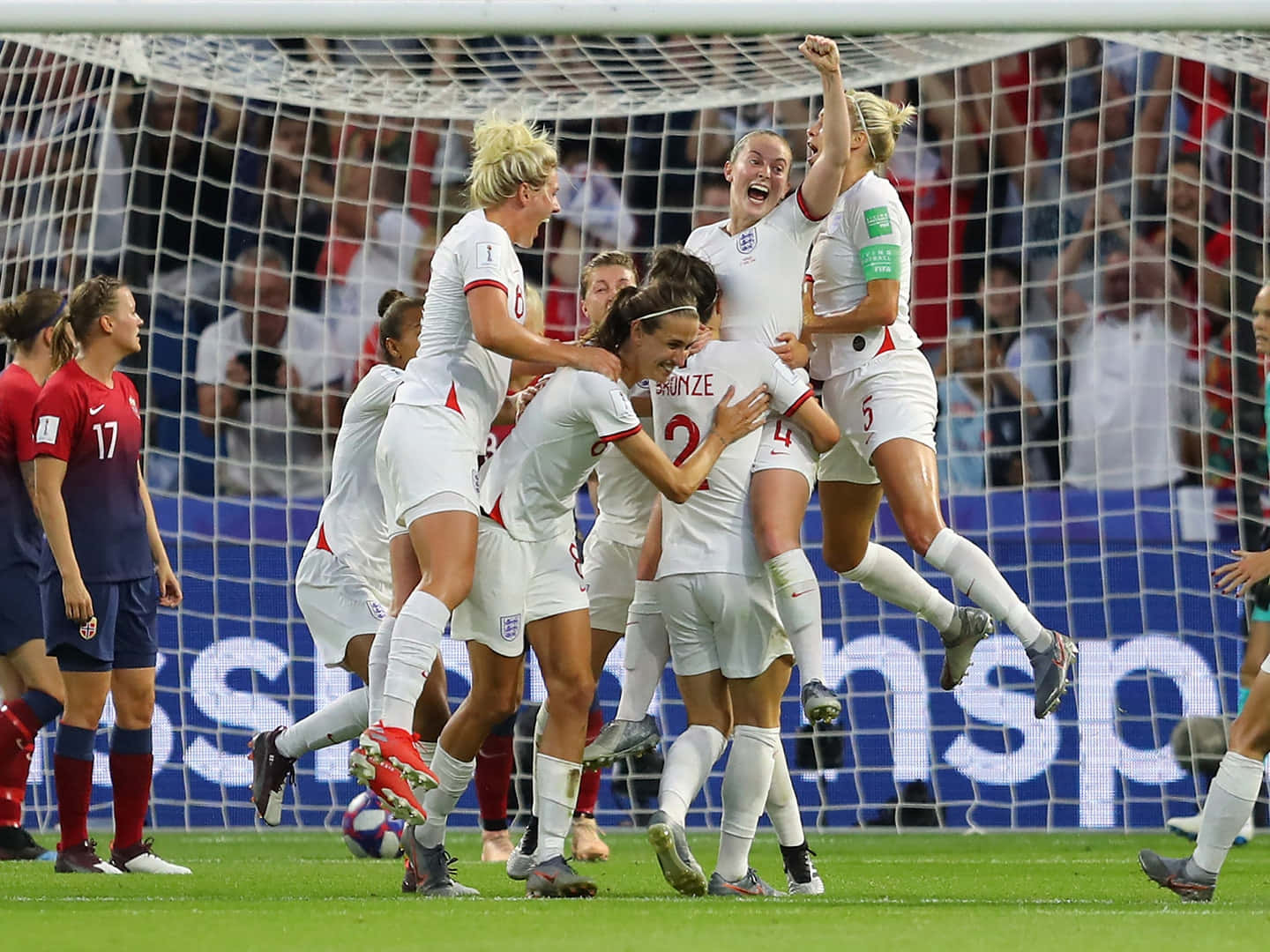 Women Soccer Team Celebration Goal Victory Wallpaper