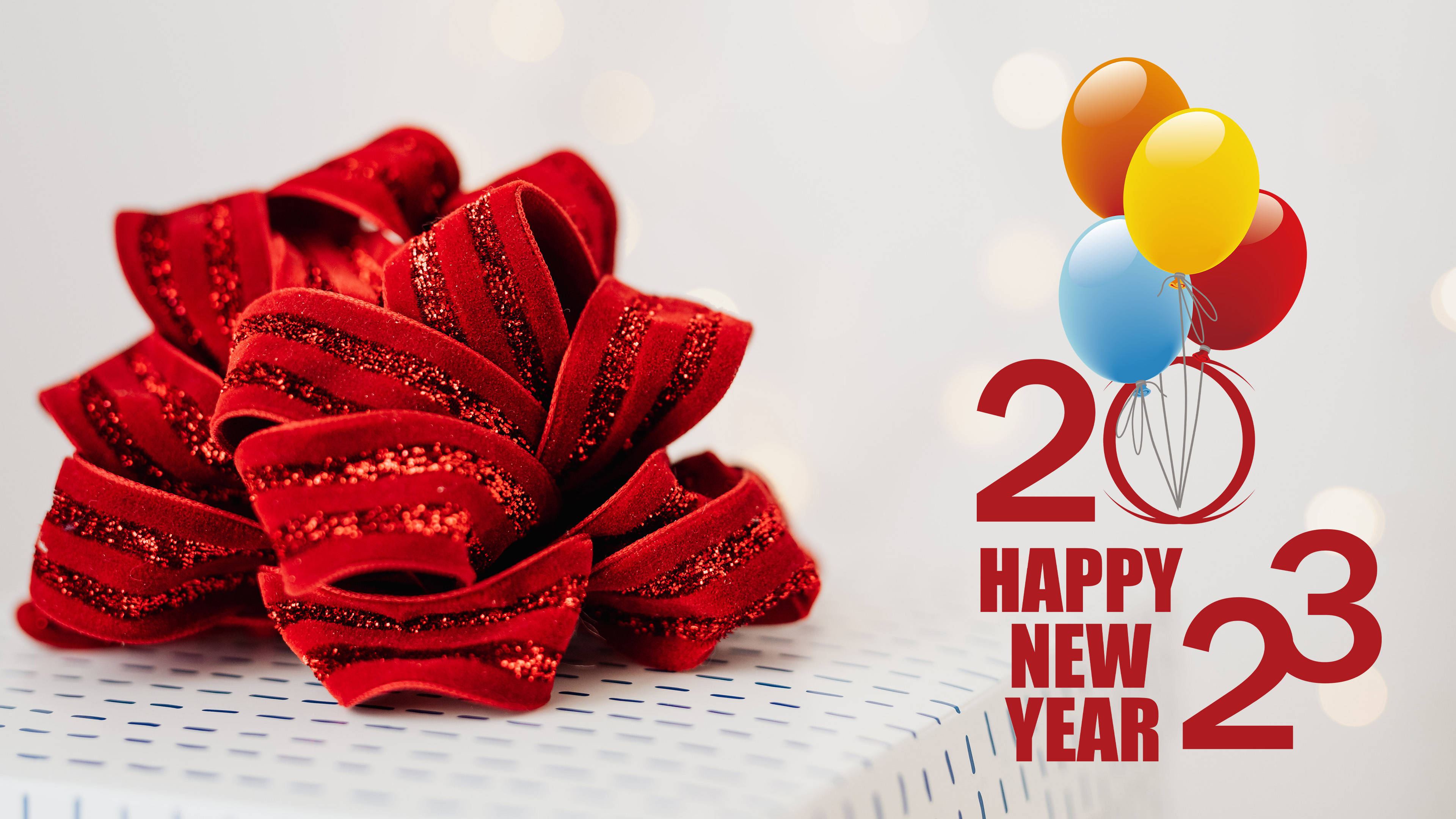 Wonderful Happy New Year 2023 Present Red Ribbon Wallpaper