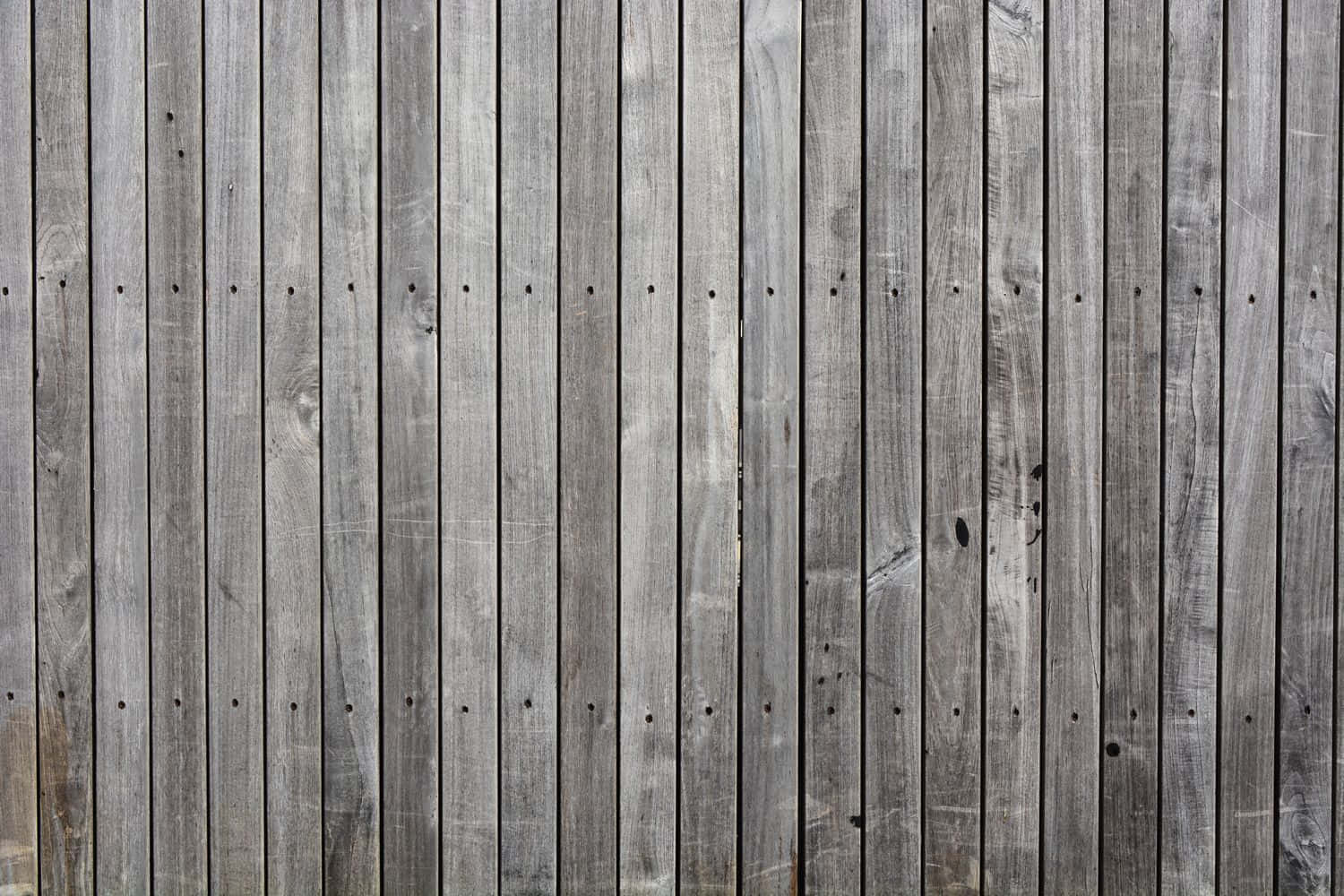 Grey Wood Planks With Nail Marks Background