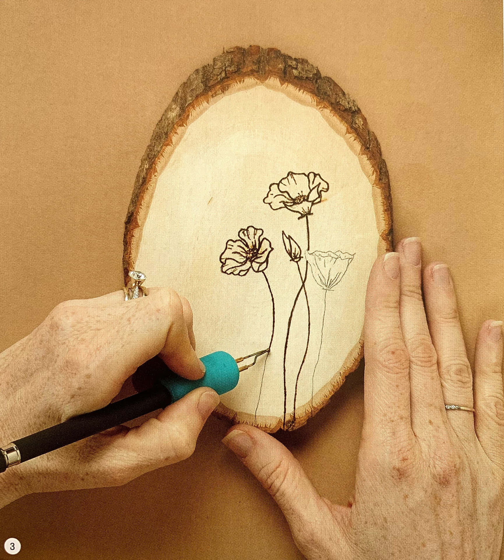 A gorgeous wood burning design, crafted in real time