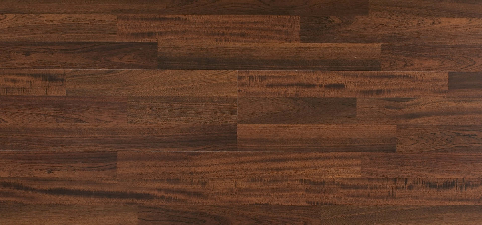 A Close Up View Of A Wooden Floor