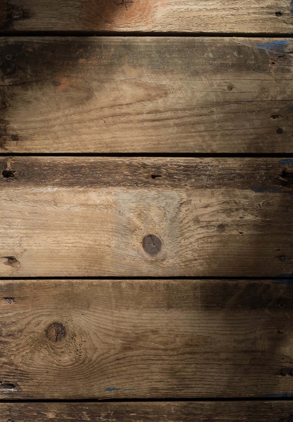 A Wooden Plank With A Light Shining Through It Wallpaper