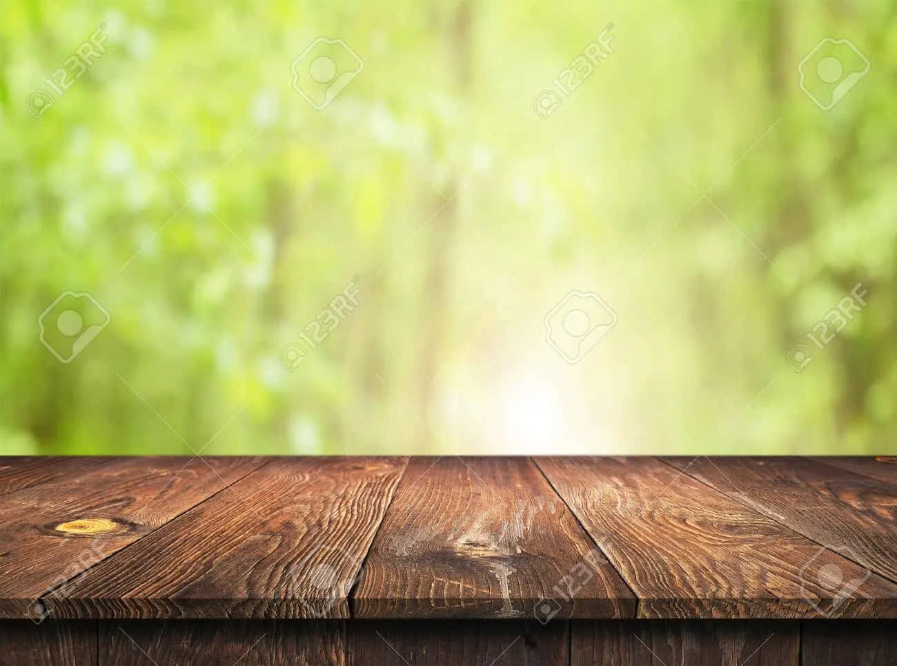 Wooden Table Top With Green Forest Background Stock Photo - Id - Id - Id