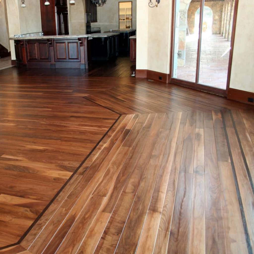 A Large Living Room With Hardwood Floors