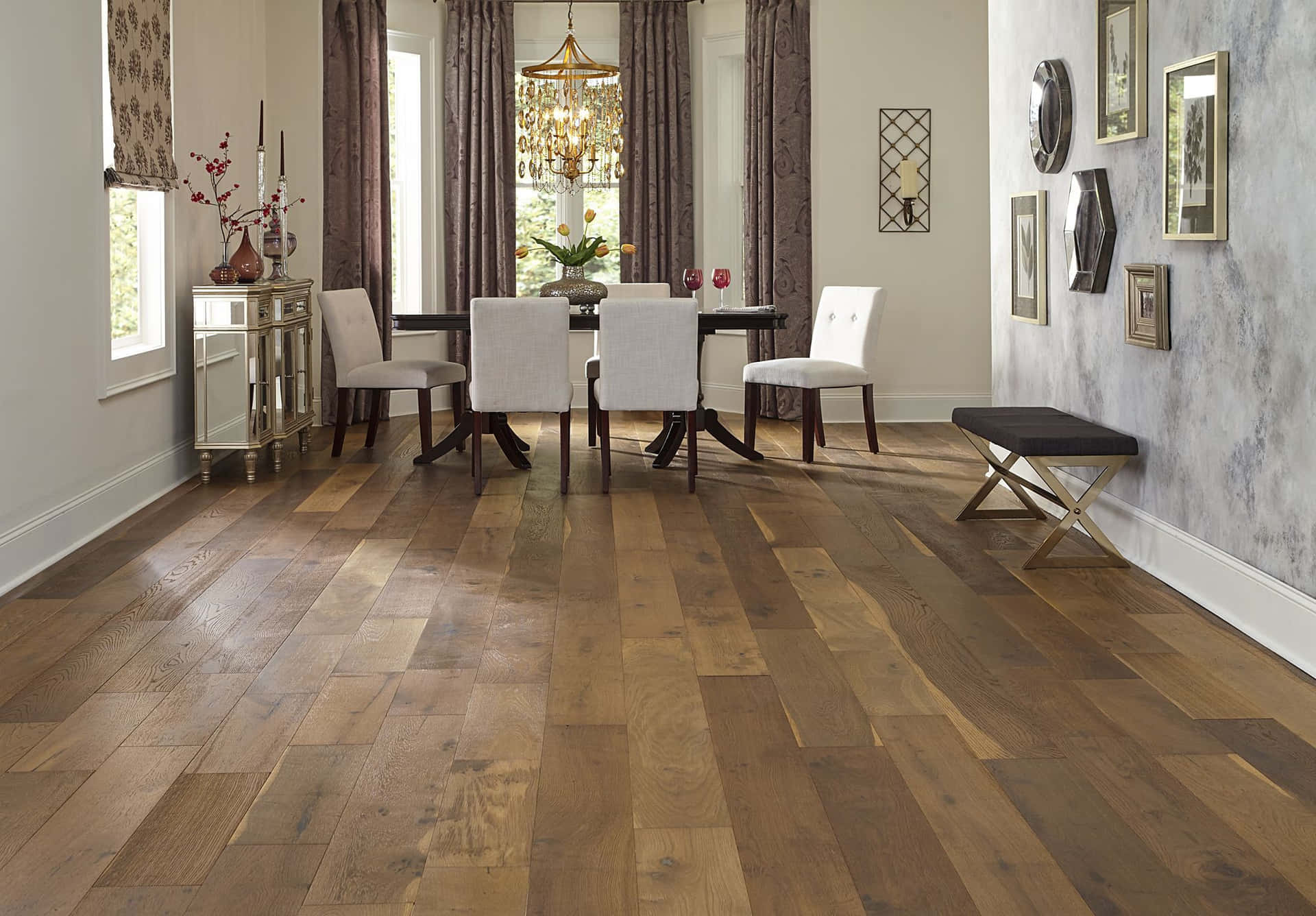 A Dining Room With Wood Floors And A Table