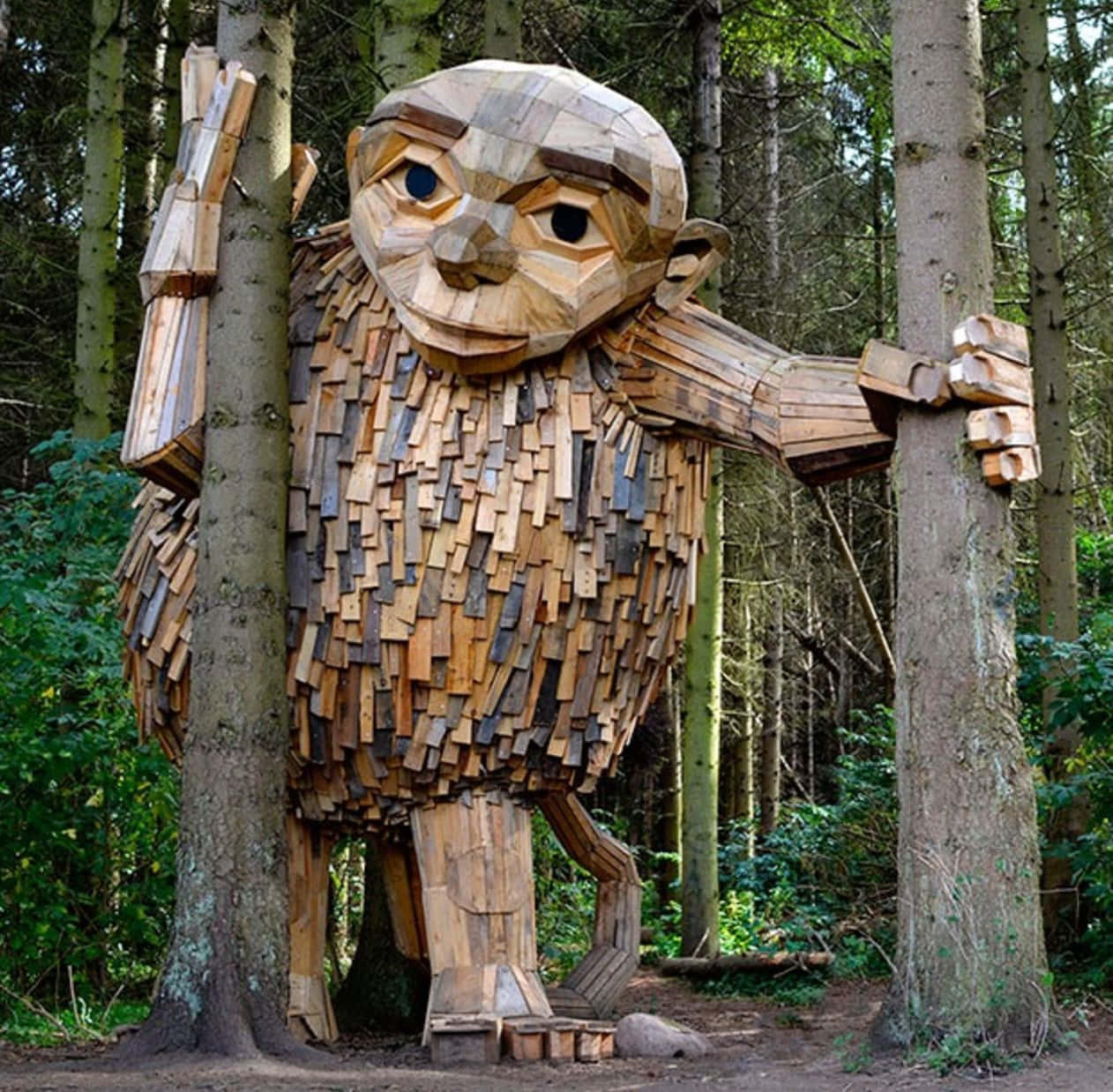 Wooden Giant Sculpture Forest Wallpaper
