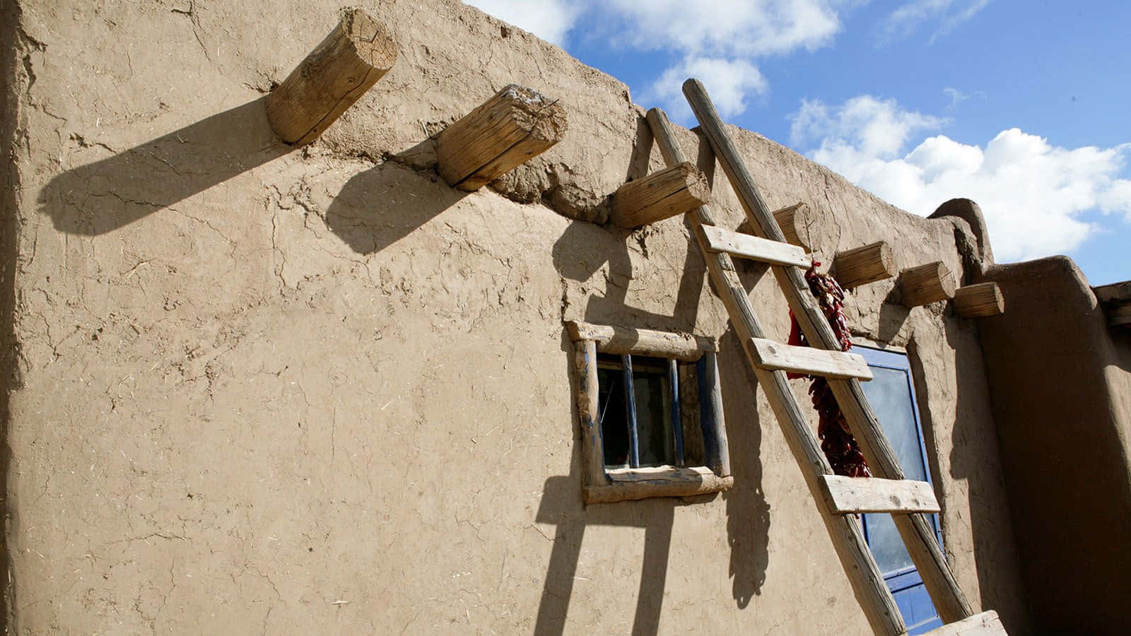 Wooden Ladders In Taos Pueblo Wallpaper