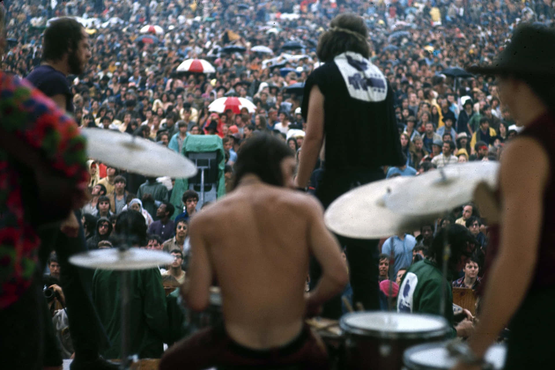 Thousands gather in the iconic Woodstock Music and Arts Fair, 1969