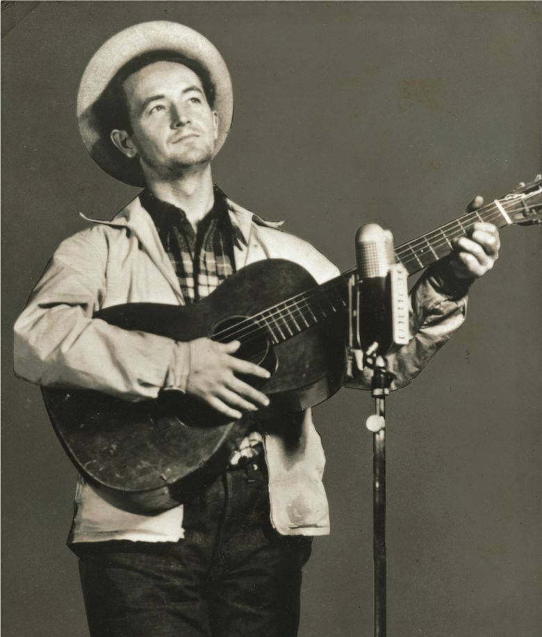 Woody Guthrie Guitar Folk Singer Wallpaper