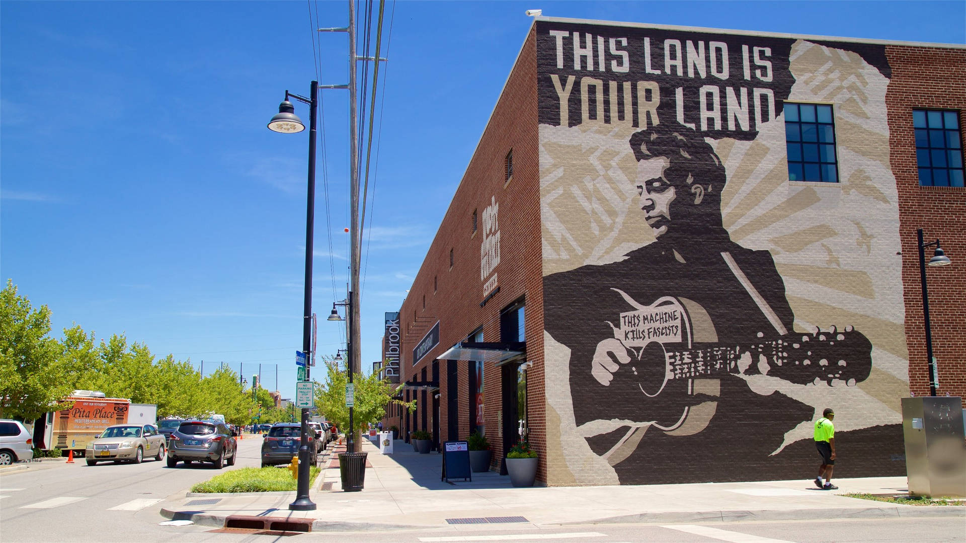 Woody Guthrie Tulsa Oklahoma skrevet på Væggen Tapeten. Wallpaper