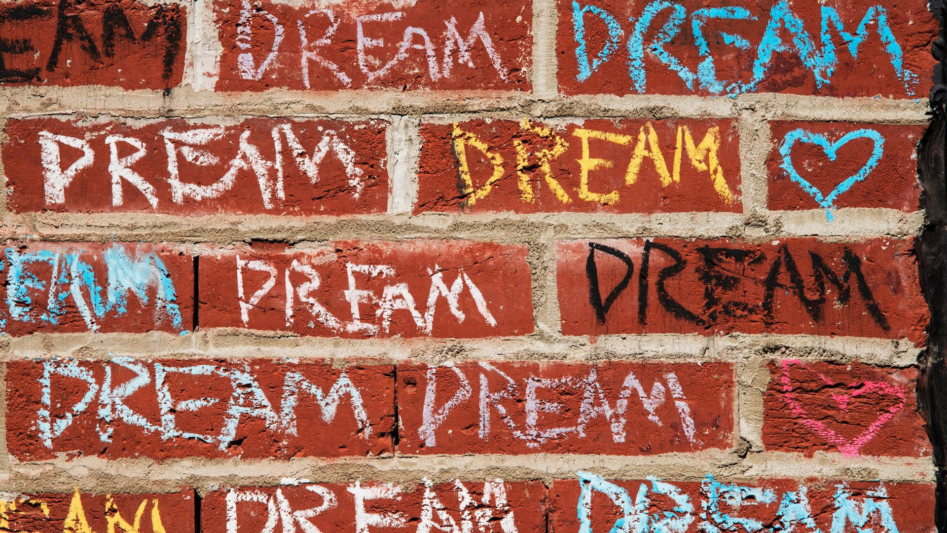 Caption: "Word Written on Brick Wall" Wallpaper