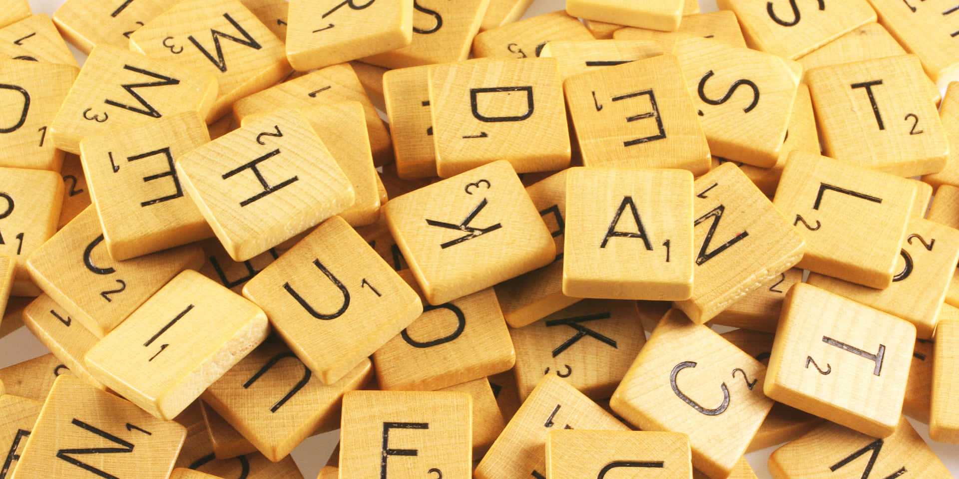 Scrabble Letters On Wooden Tiles