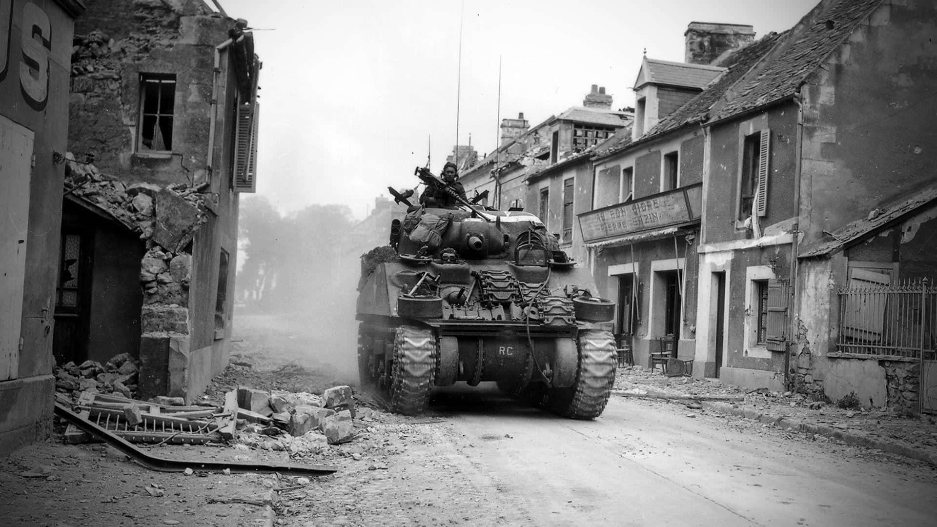 A Tank Drives Down A Street In A Destroyed Town