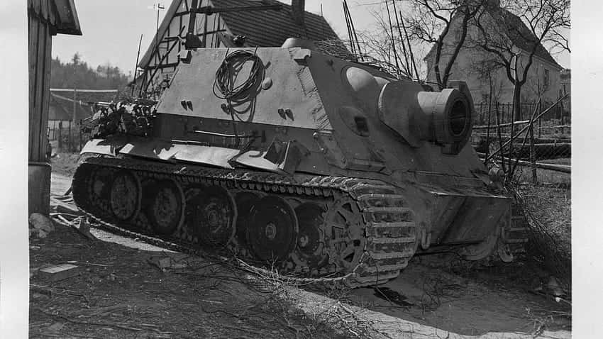A Tank Is Parked In A Yard