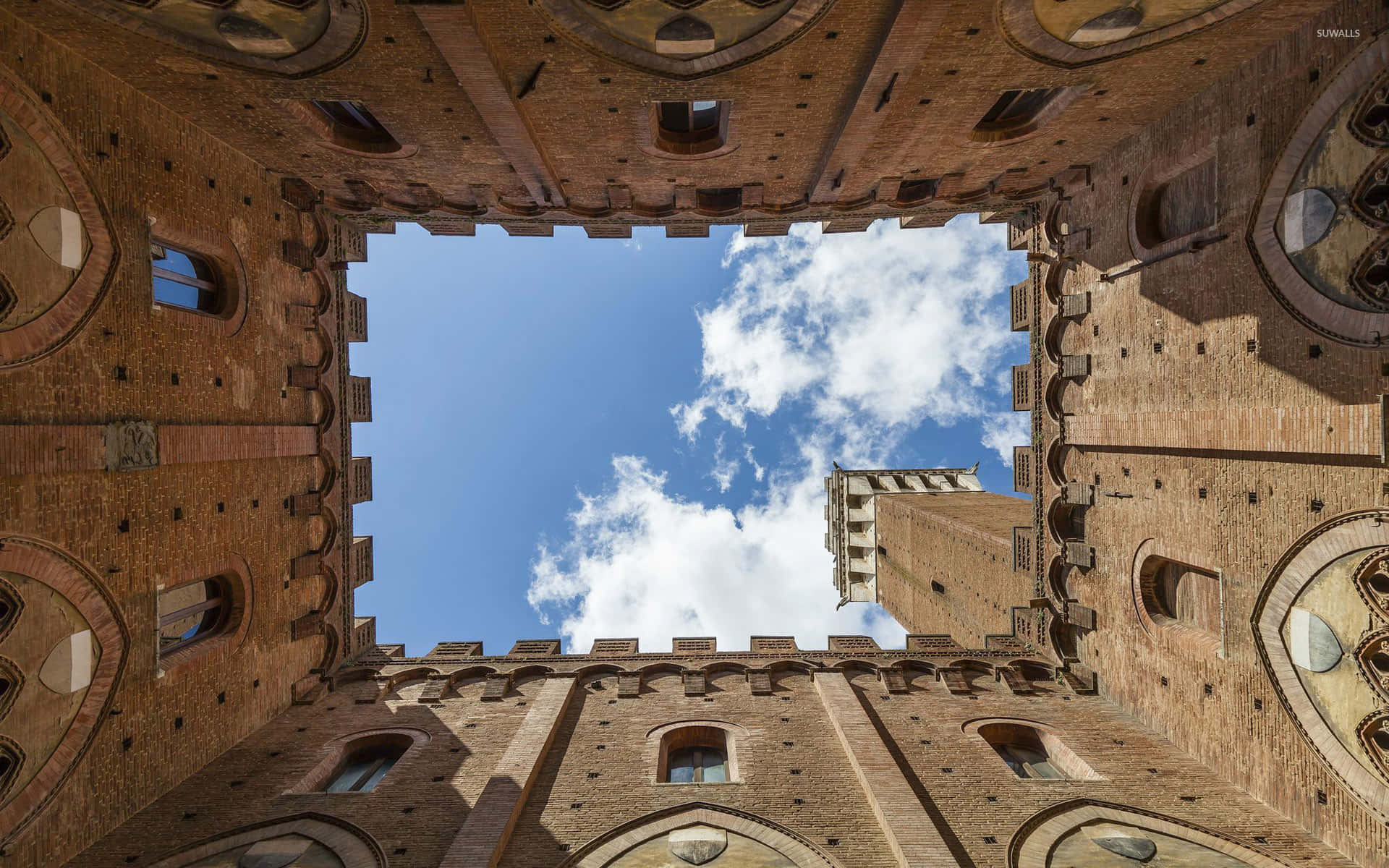 Worm's Eye View Of Pubblico Palace In Siena Italy Wallpaper