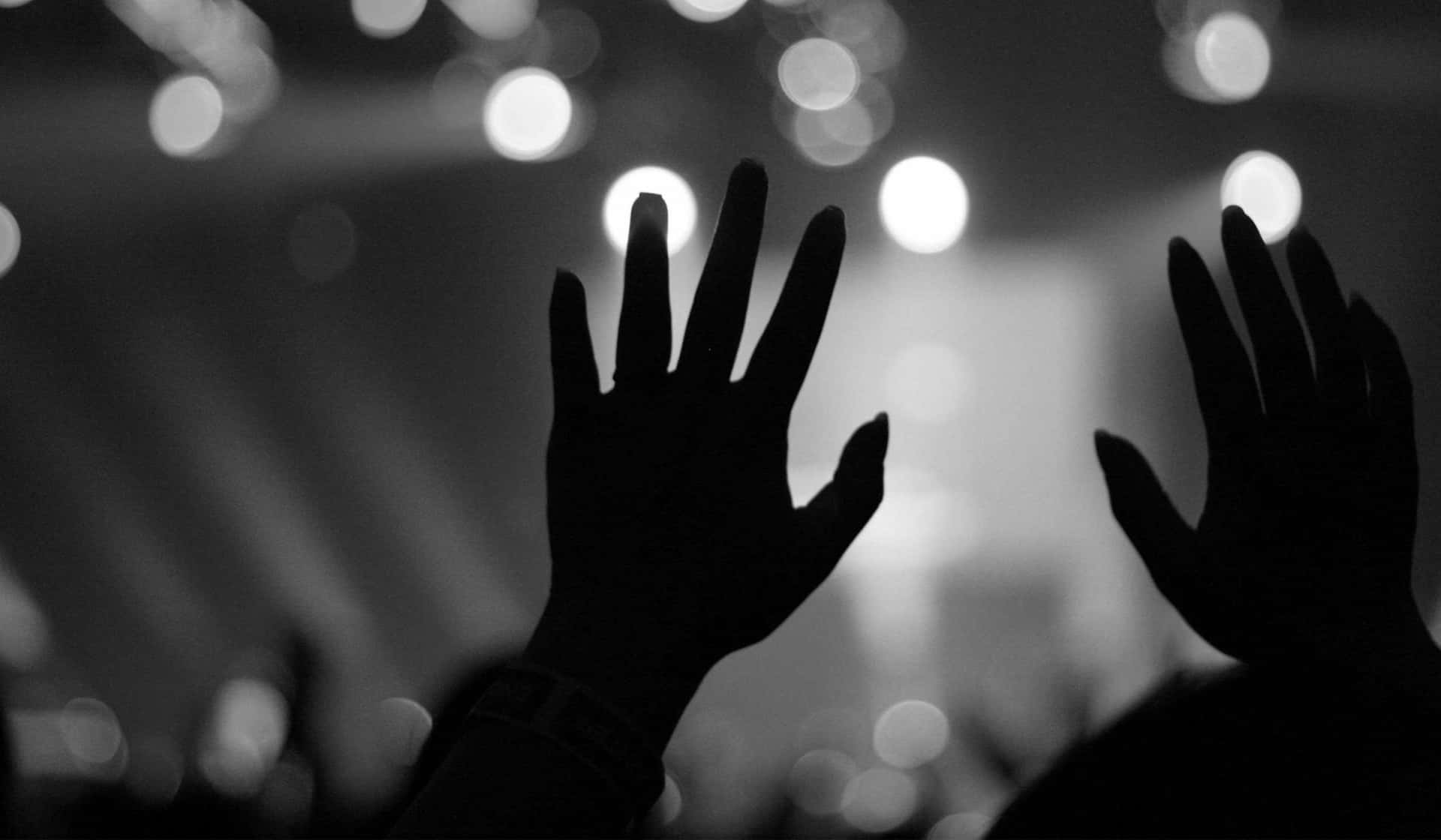 Two Hands Raised To God Worship Background