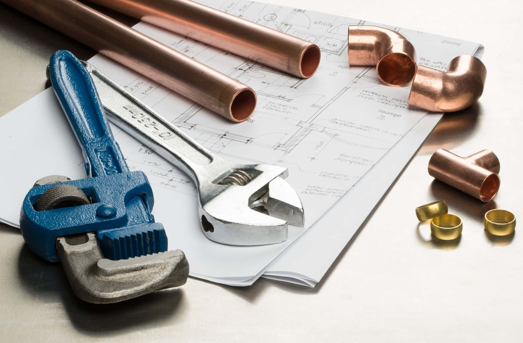 Wrench And Copper Plumbing Fittings Wallpaper