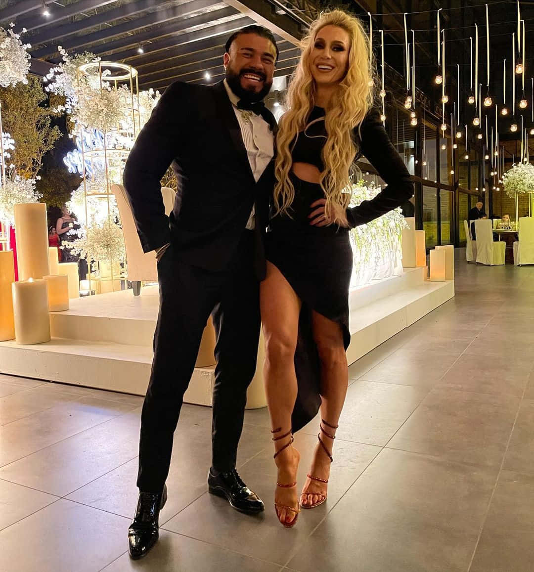 Professional Wrestler Andrade El Idolo with Wife, Charlotte Flair Wallpaper