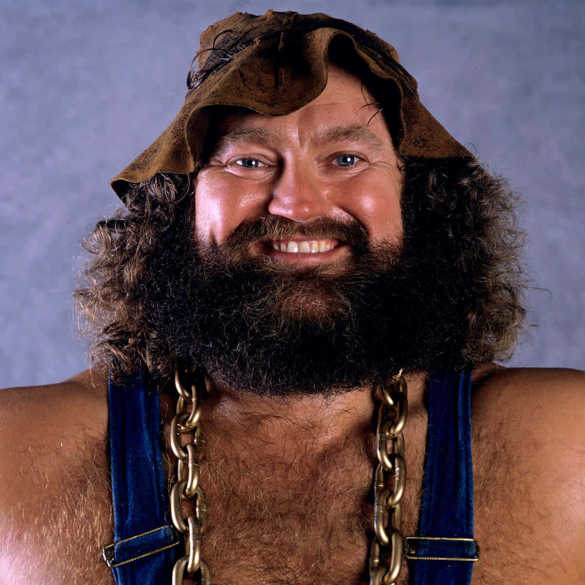 Legendary Wrestler Hillbilly Jim Smiling Portrait Wallpaper