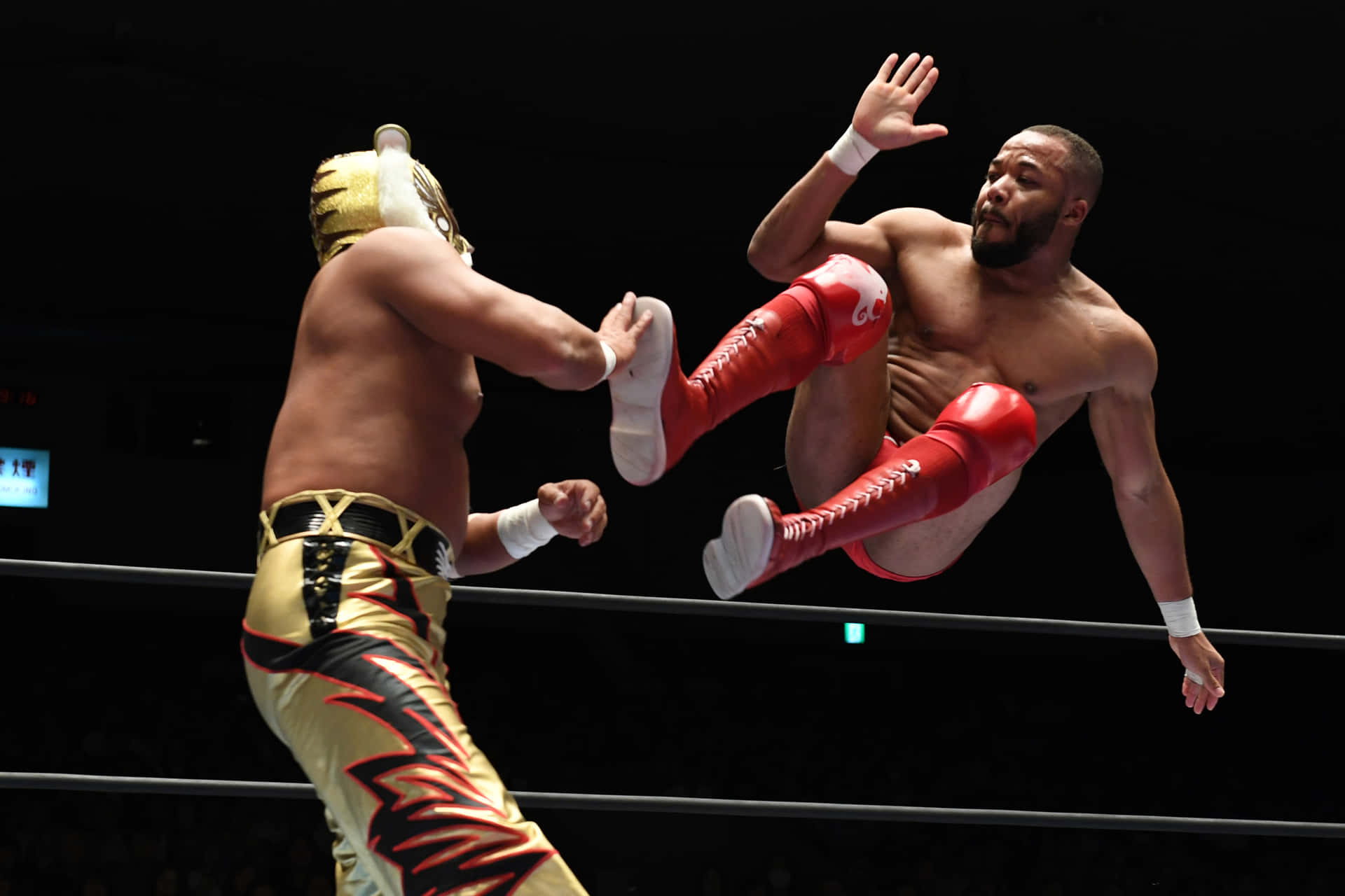 Wrestler Jonathan Gresham Against Ryusuke Taguchi Wallpaper