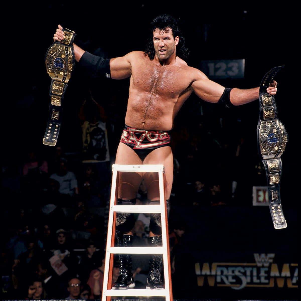 Wrestler Scott Hall With Championship Belts Background