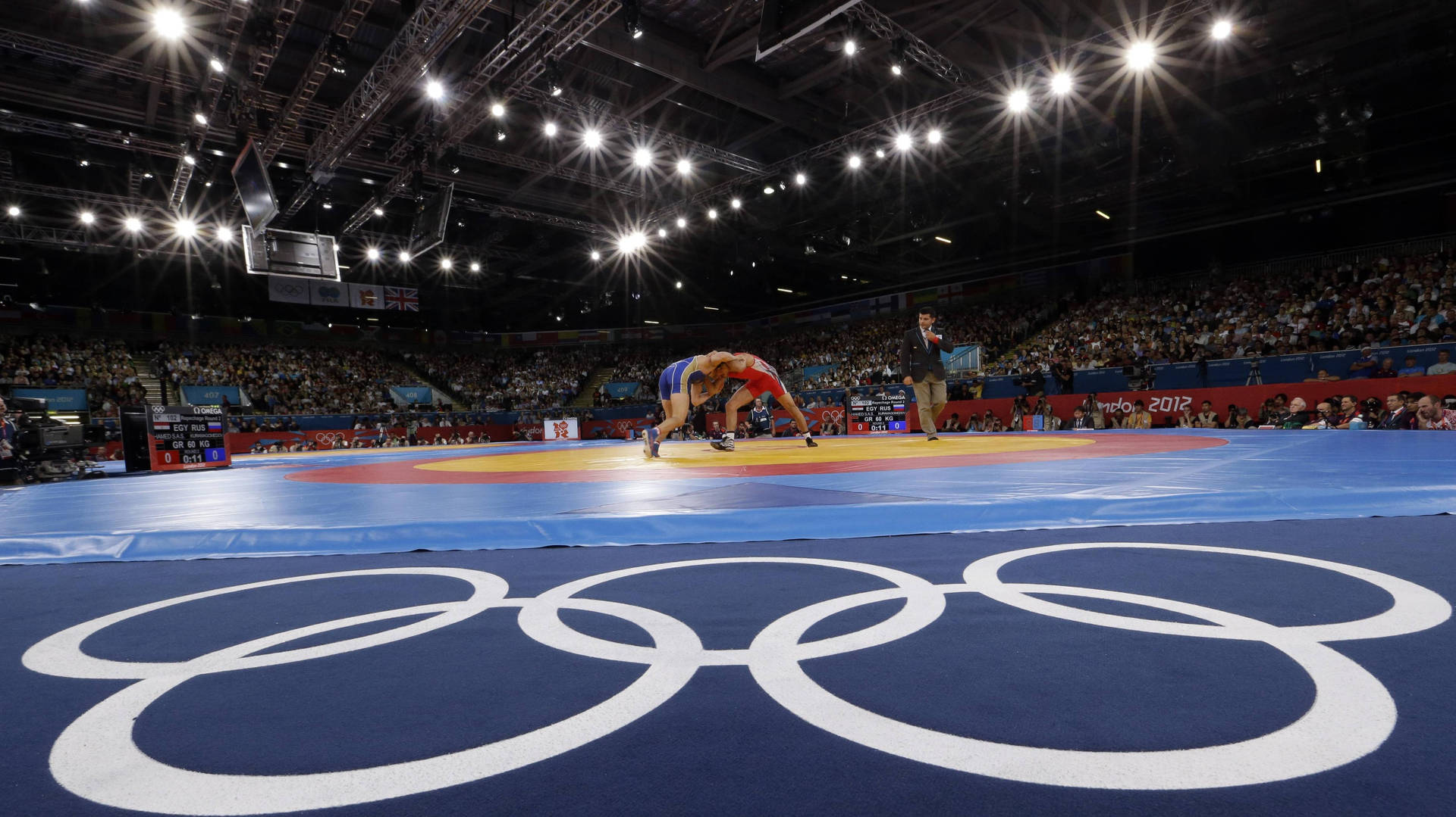 Wrestling Match In Olympic Games Wallpaper
