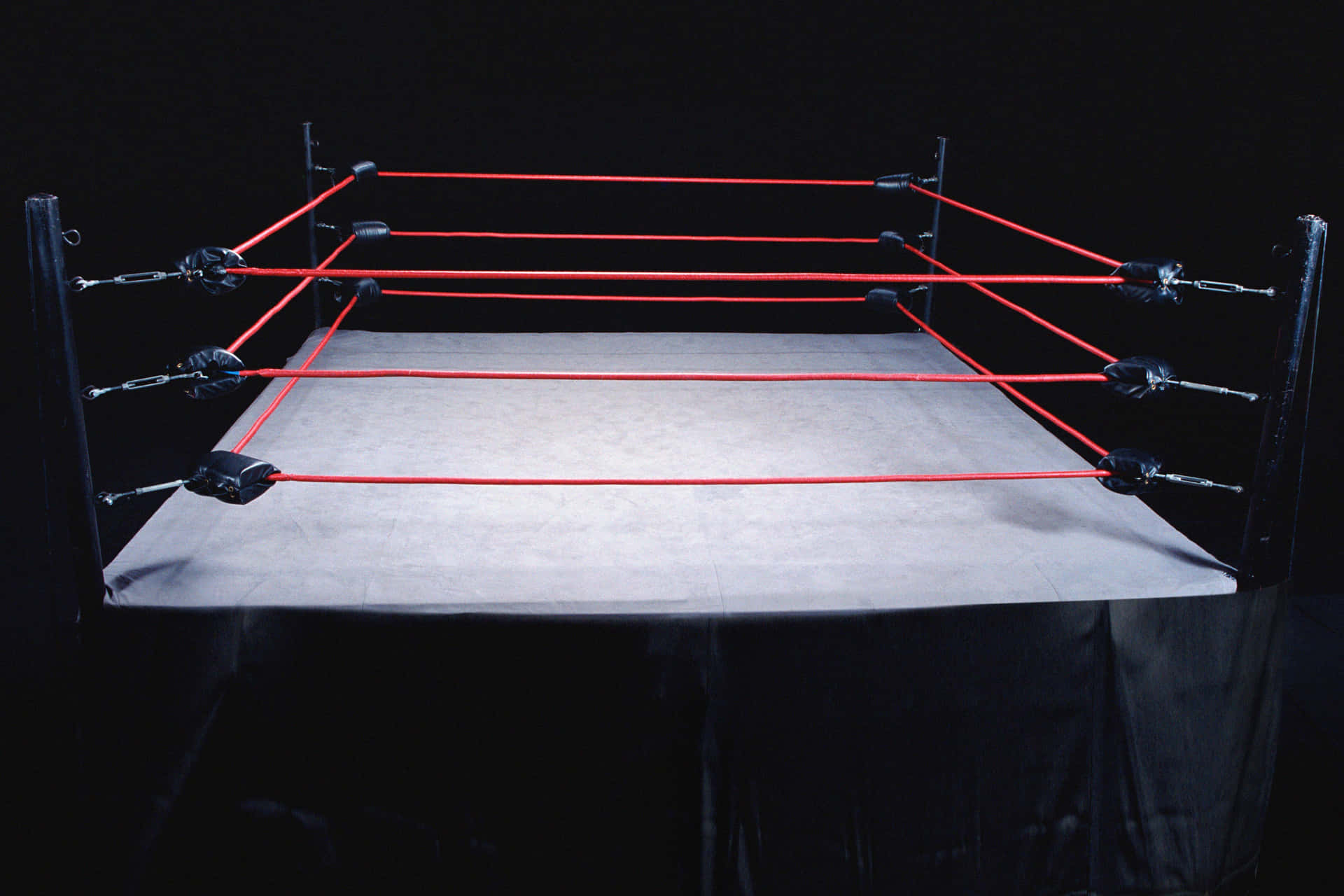 A Wrestling Ring With Red Ropes