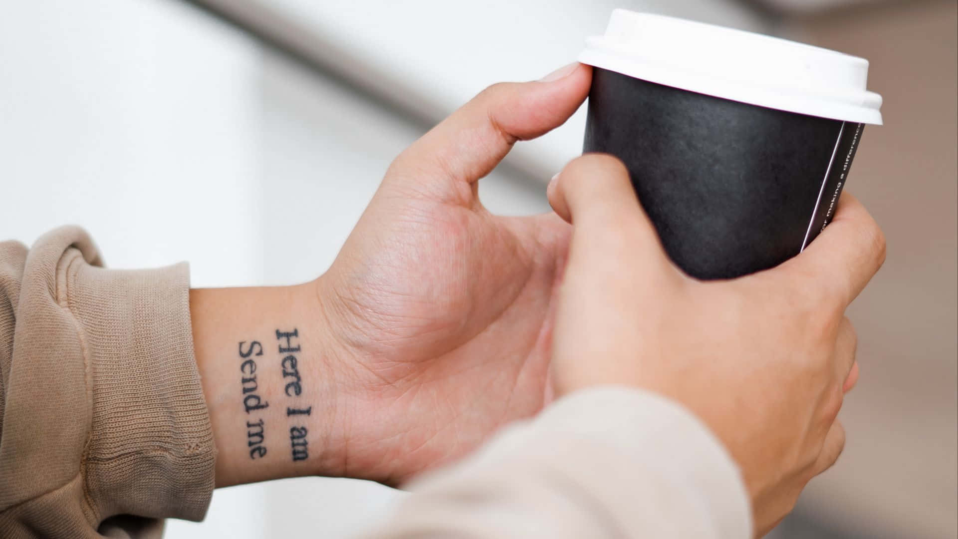 Wrist Tattoo Holding Coffee Cup Wallpaper