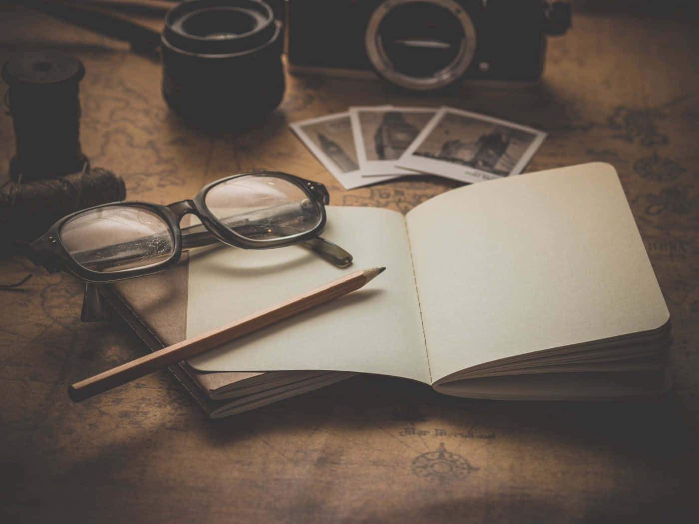 Writing Notebook And Eyeglasses Wallpaper