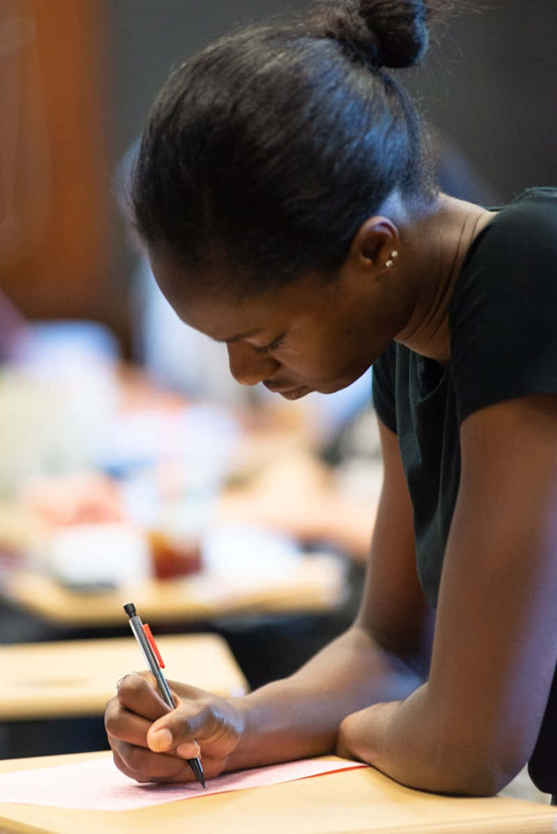 Black Young Lady Writing Picture