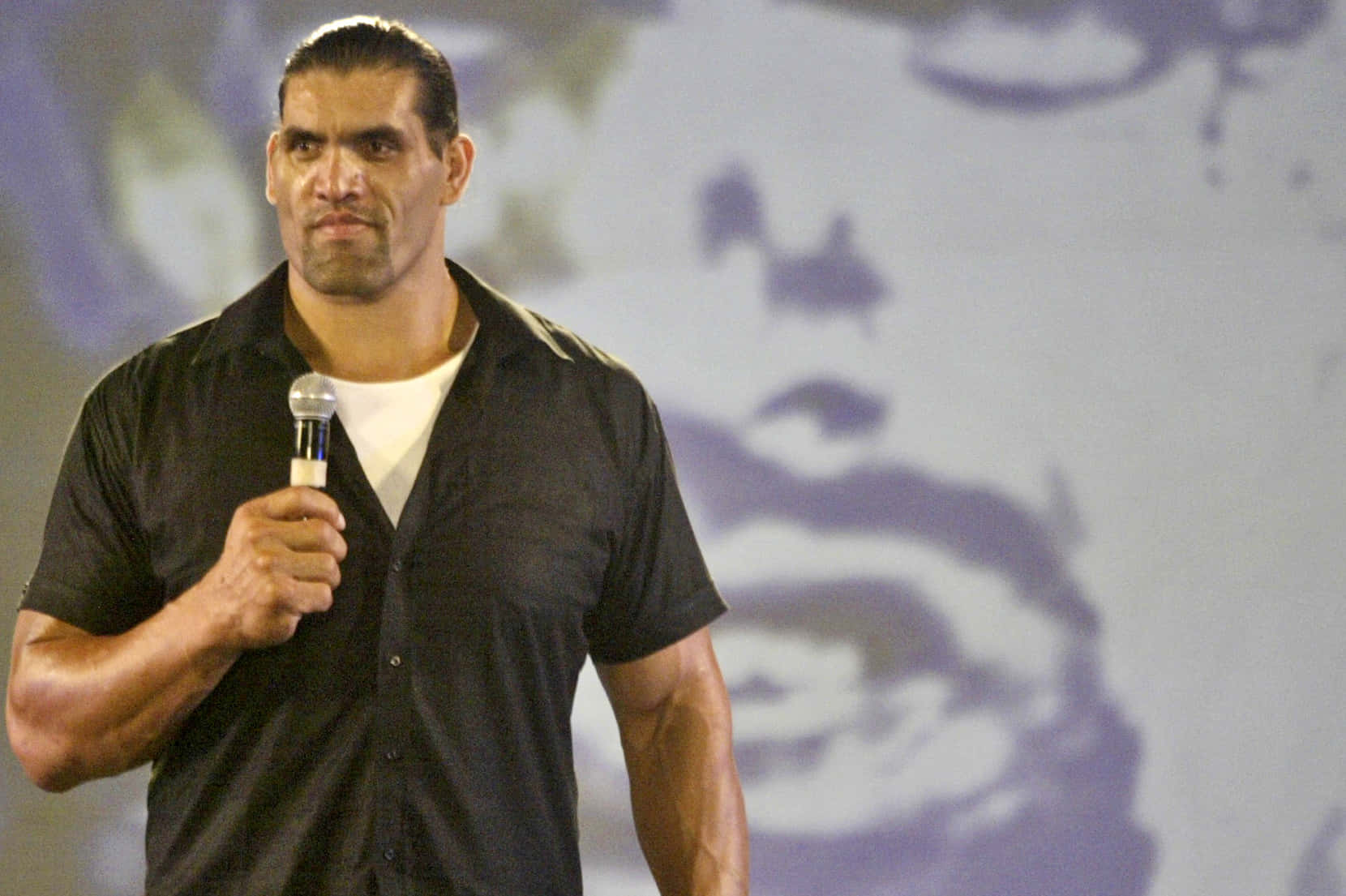 WWE Indian Wrestler The Great Khali During Promotional Event Wallpaper