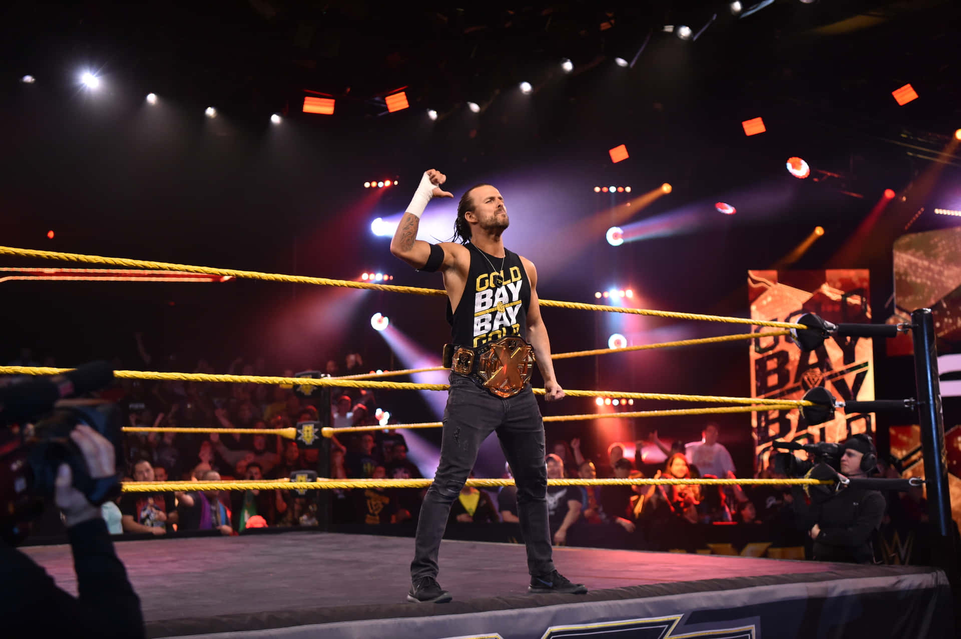 Wwe Nxt Adam Cole Standing Outside The Ring Wallpaper
