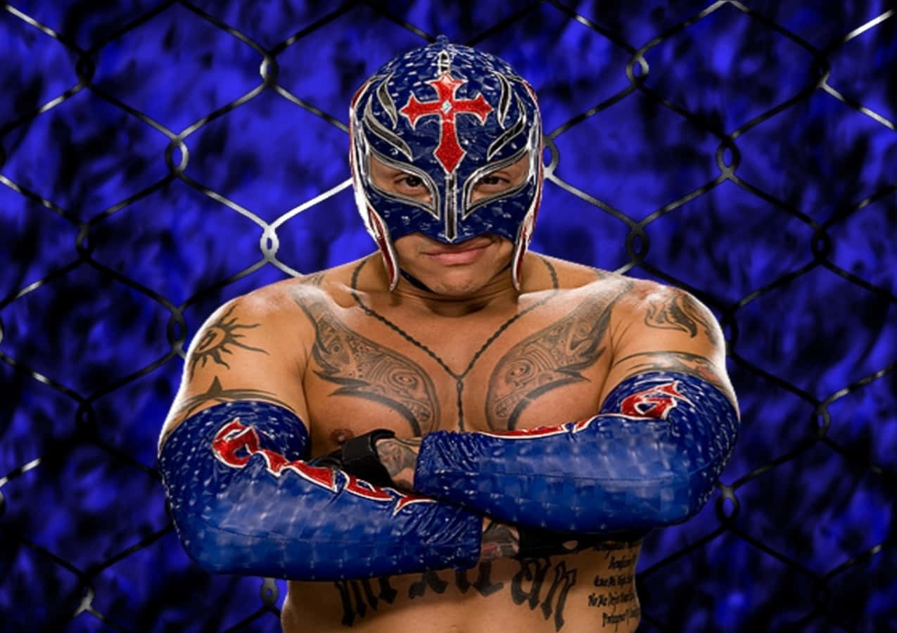 A Luchador With Tattoos And A Cross On His Face