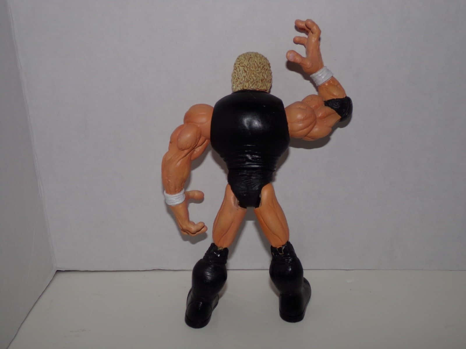 WWE Sid Vicious Action Figure in Classic Pose Wallpaper