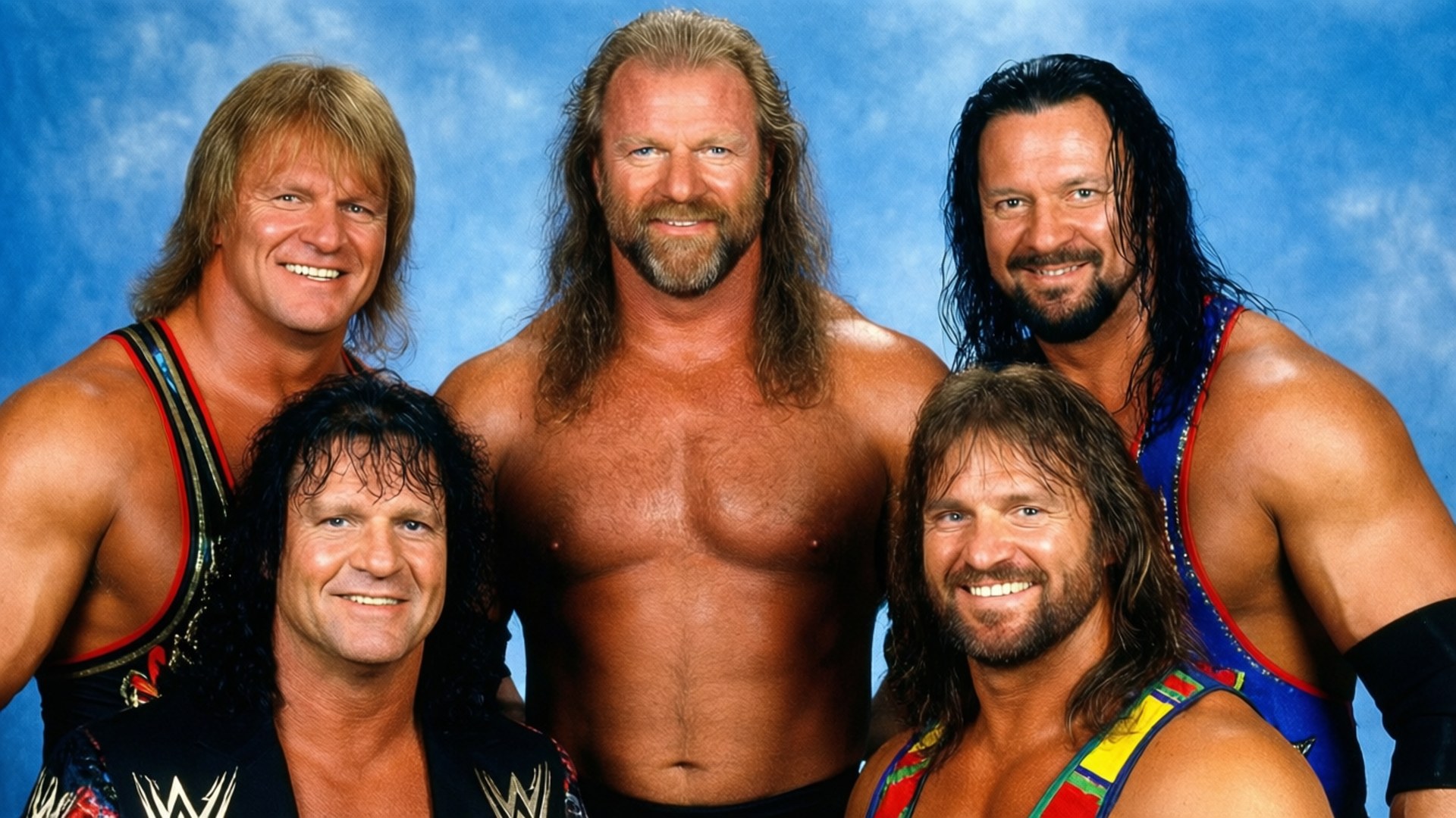 Gruppfoto av Dan Severn med andra WWF-brottare från 90-talet.