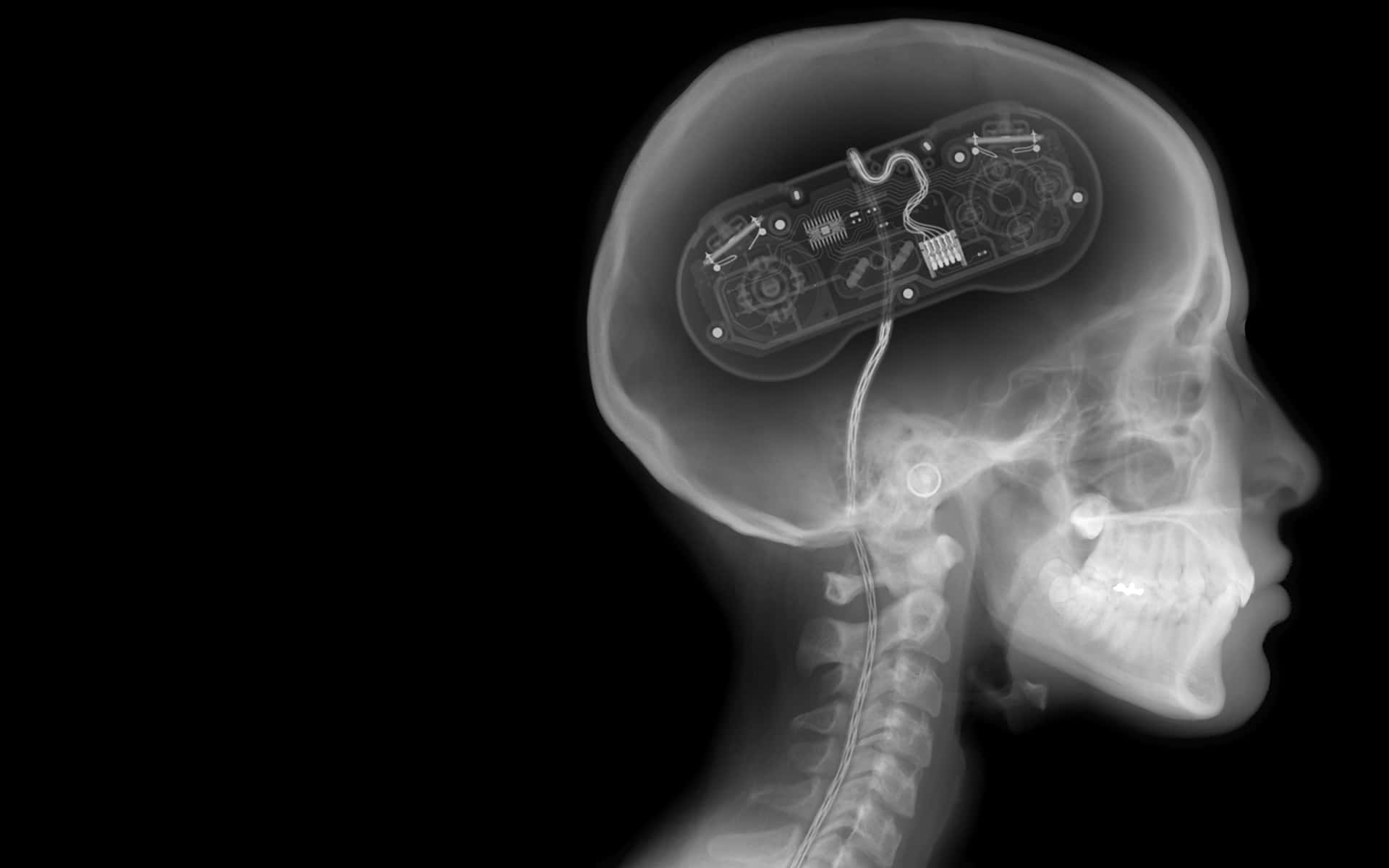 A Person's Head Is Shown With A Video Game Controller Wallpaper