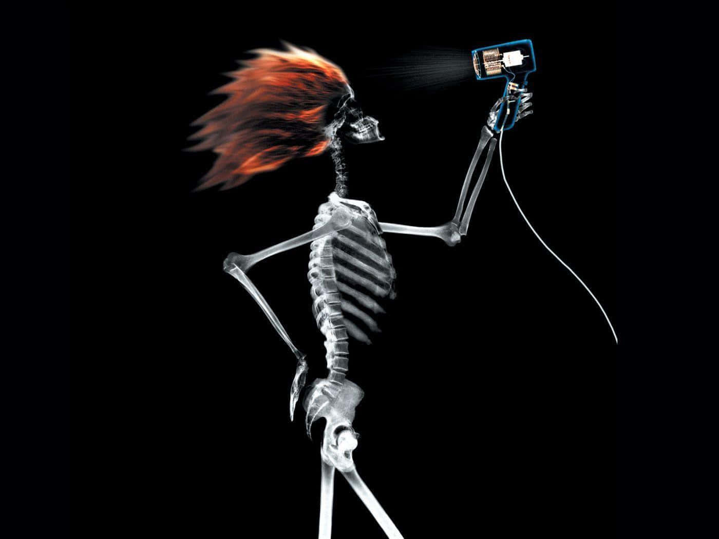 A Skeleton Holding A Cell Phone