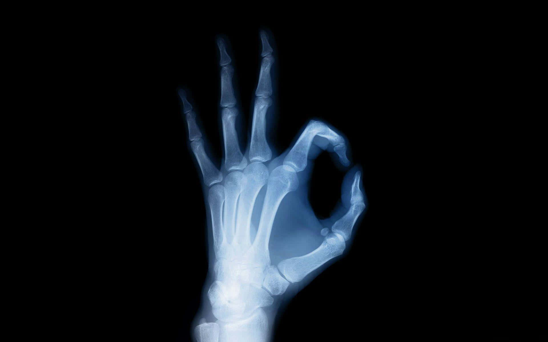 A Hand With A Skeleton Showing An Ok Sign