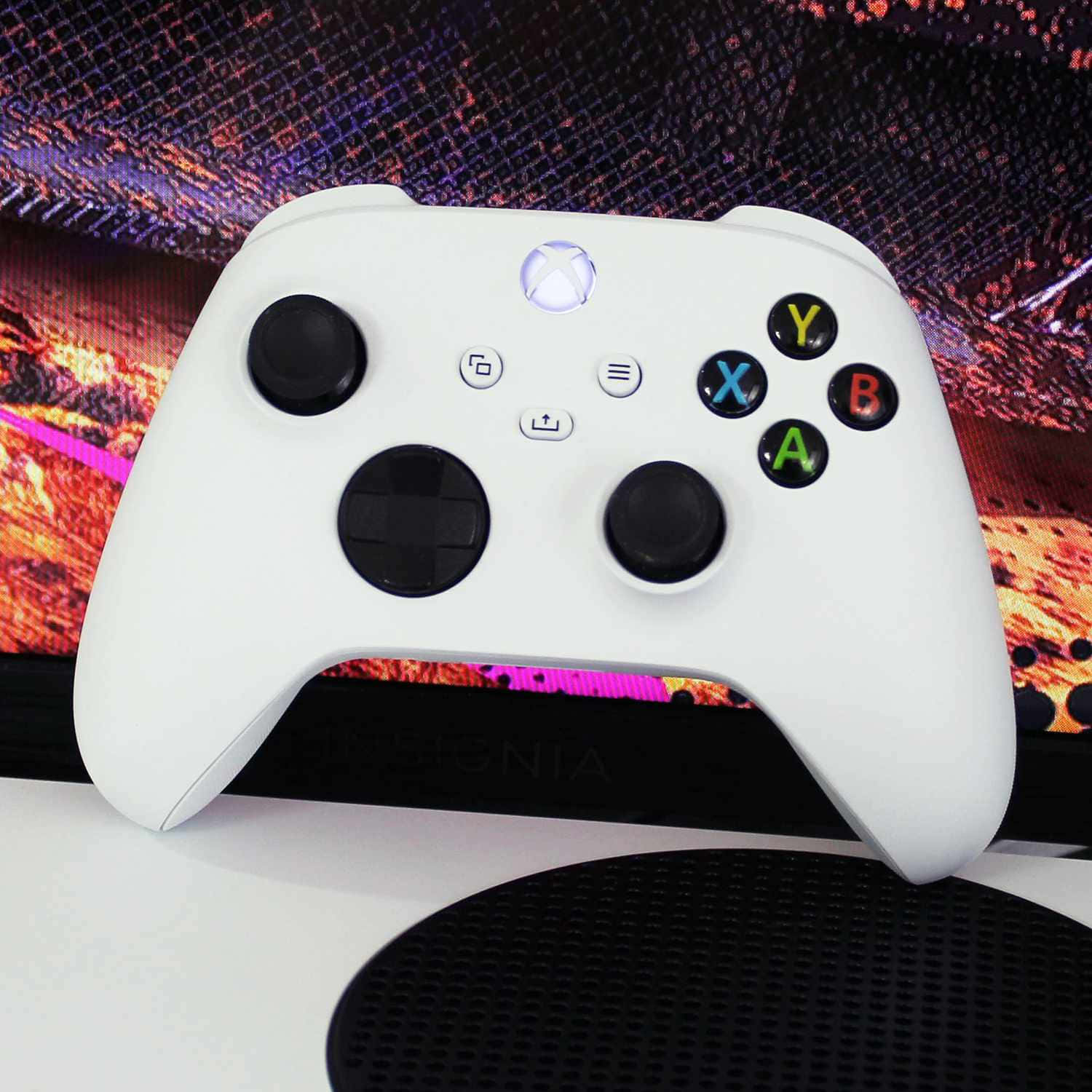 A White Xbox One Controller On A Desk
