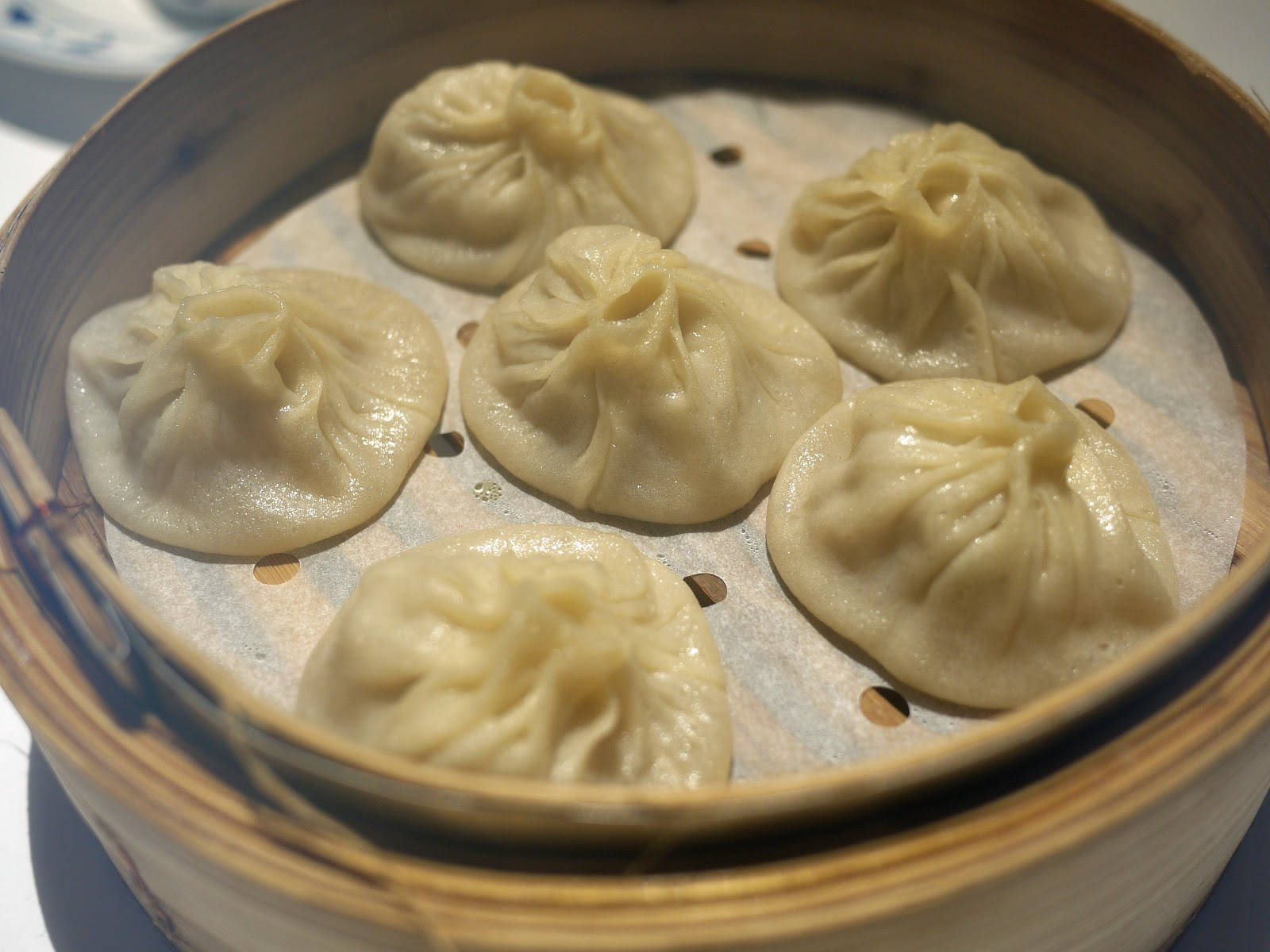 Xiaolongbao On A Traditional Bamboo Steamer Wallpaper