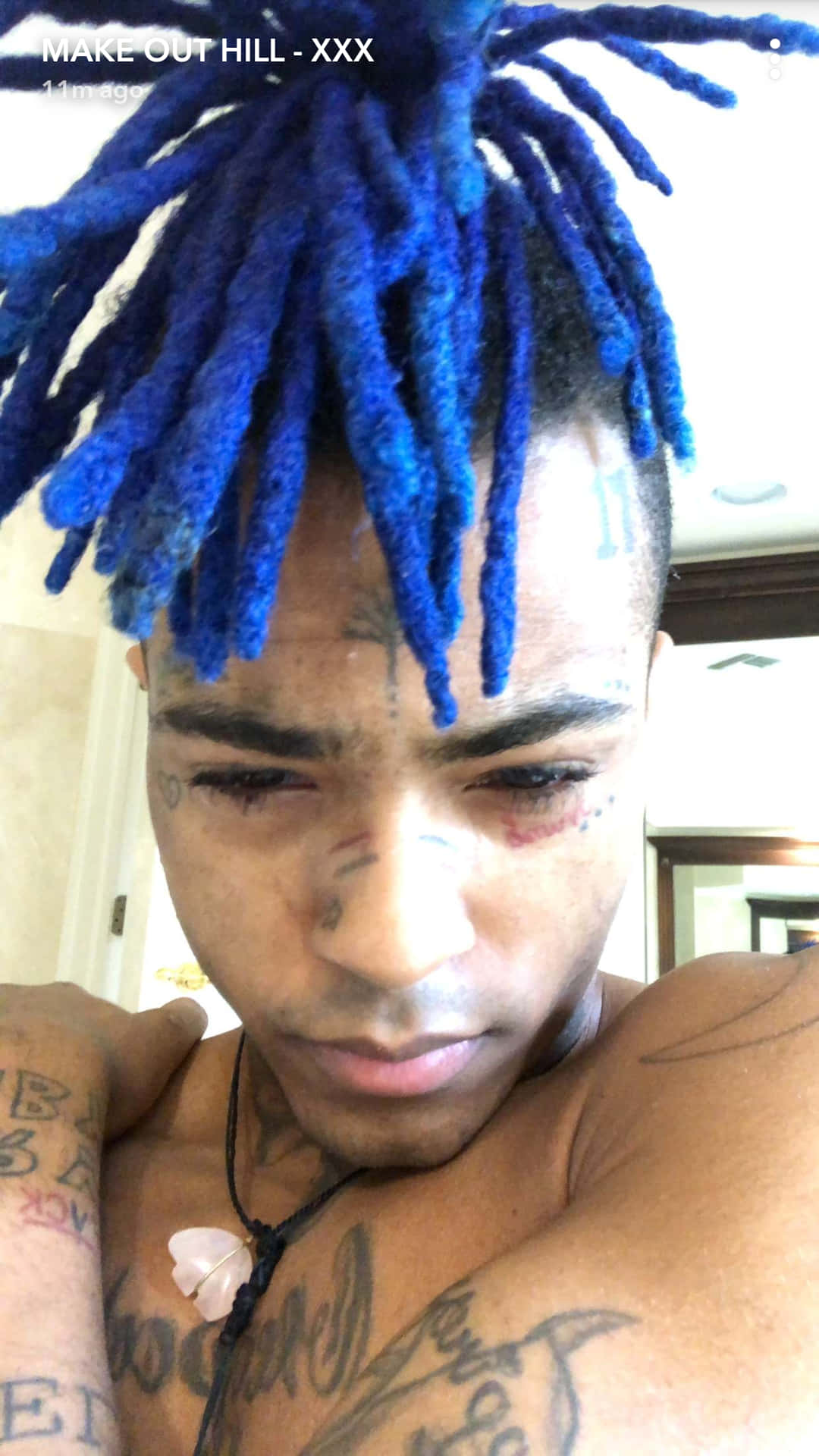"XXXTentacion stands out with his blue hair." Wallpaper