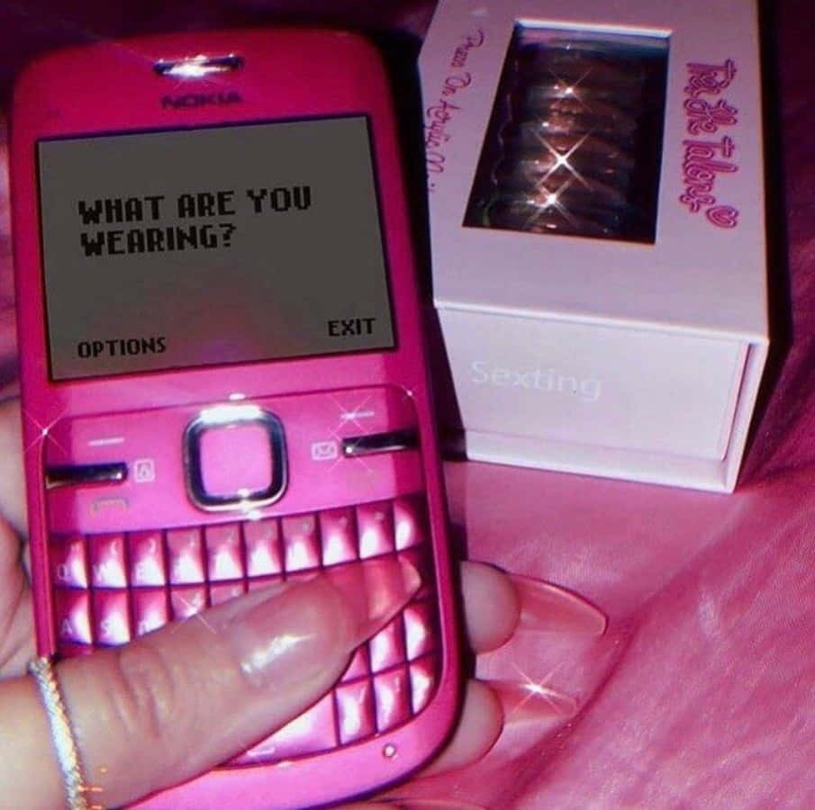 A Pink Cell Phone With A Message On It