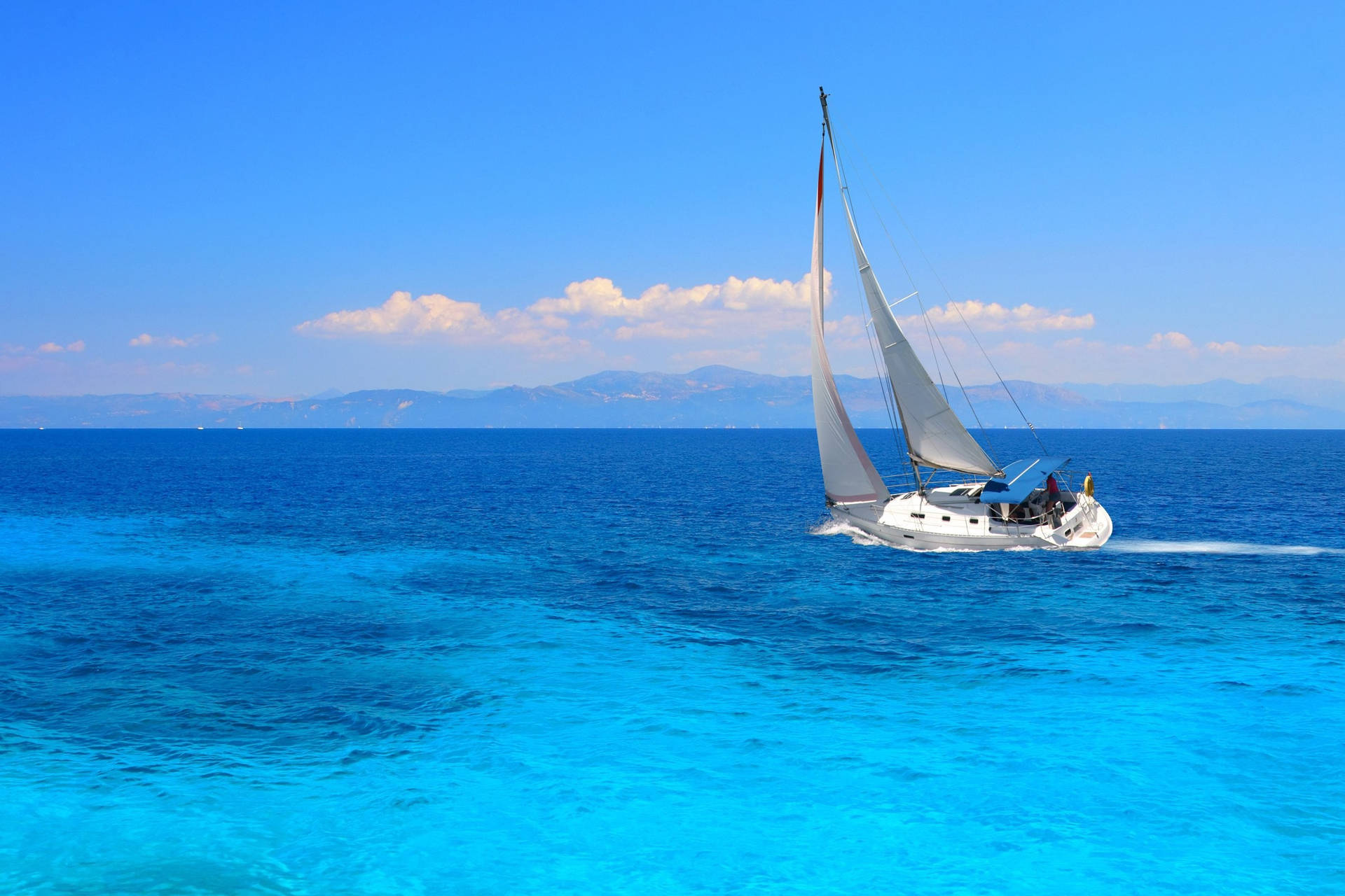Yacht Clear Blue Ocean Wallpaper