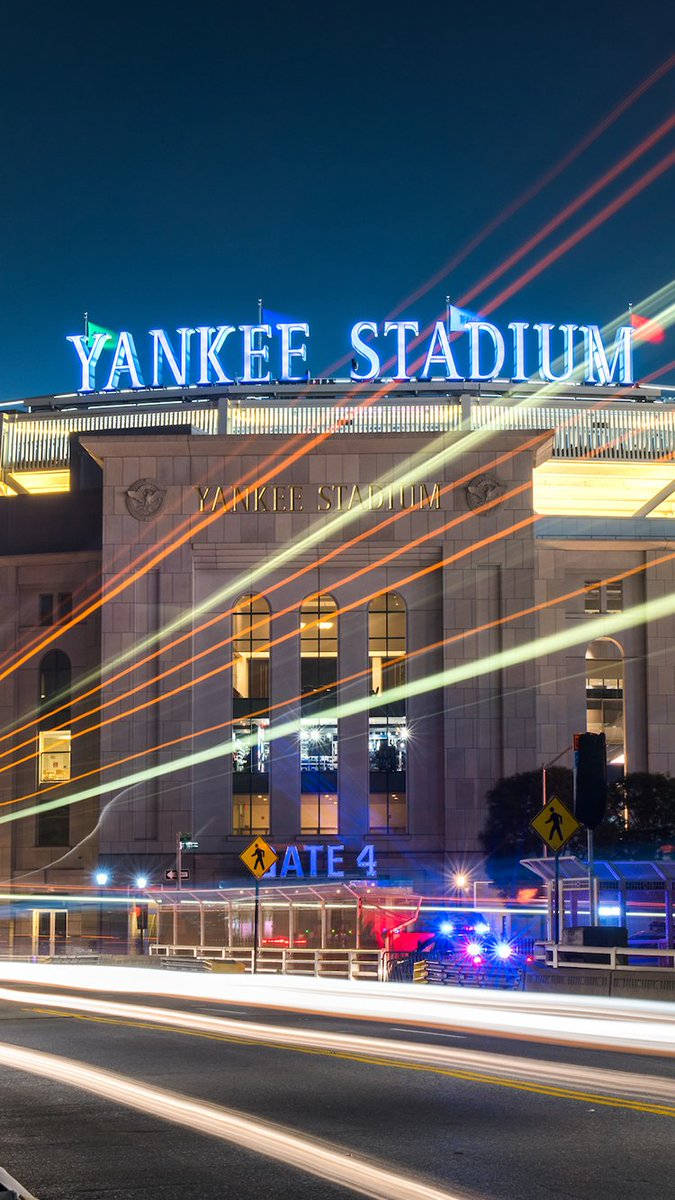 Yankee Stadium Exterior With Lights Wallpaper