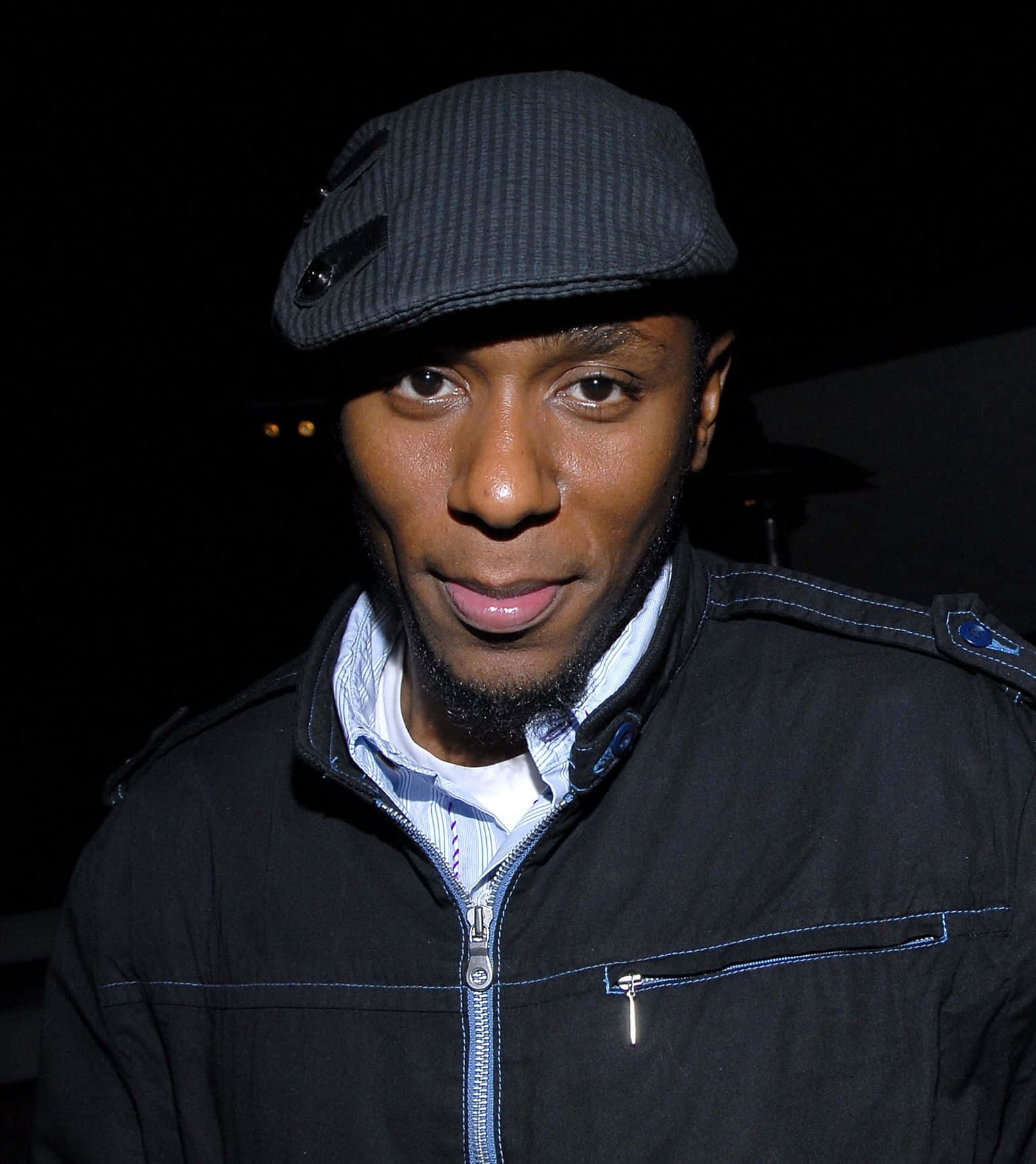 Yasiin Bey In A Promotional Photo Shoot Wallpaper