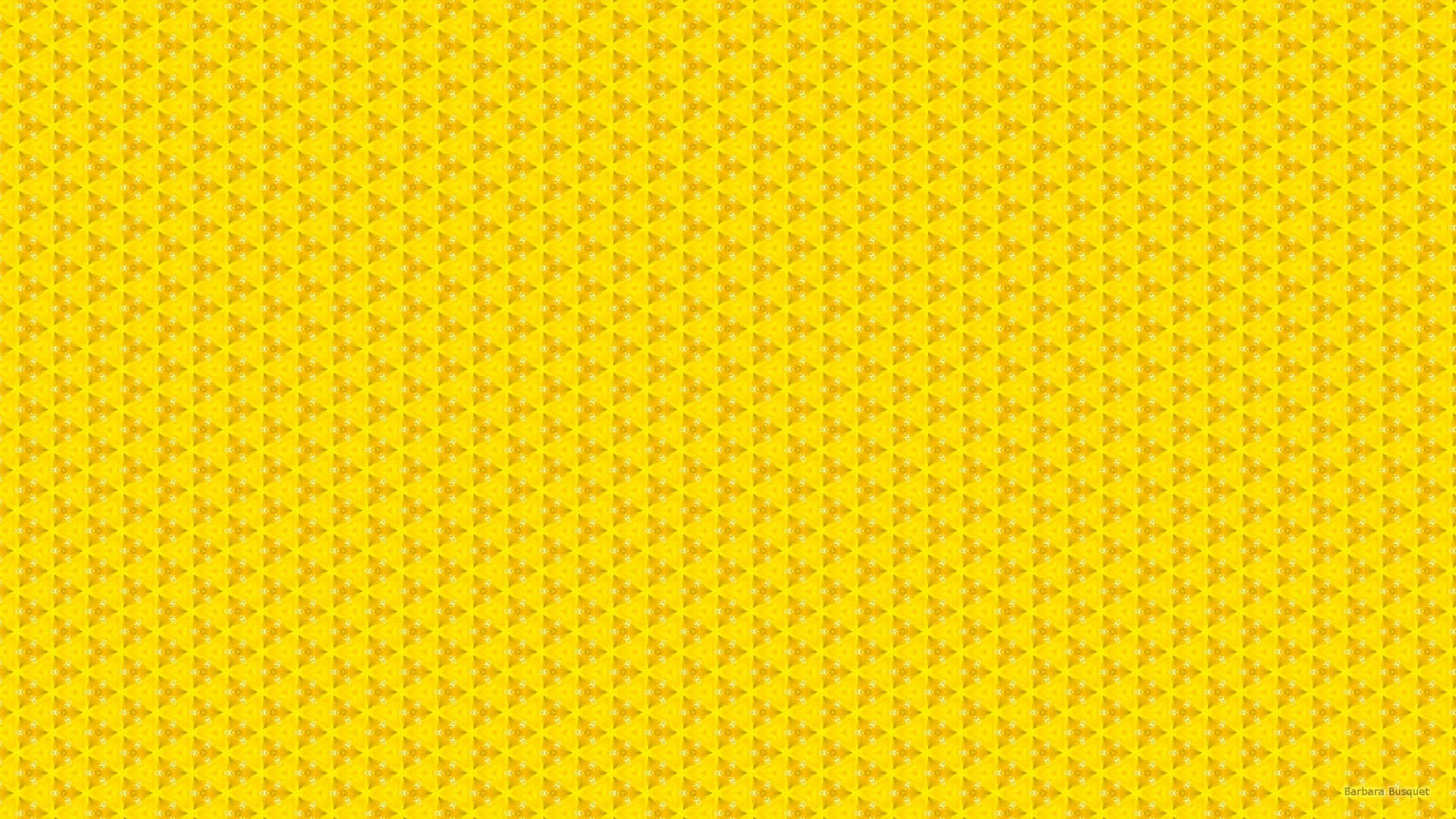 En gul baggrund med et mønster af prikker Wallpaper