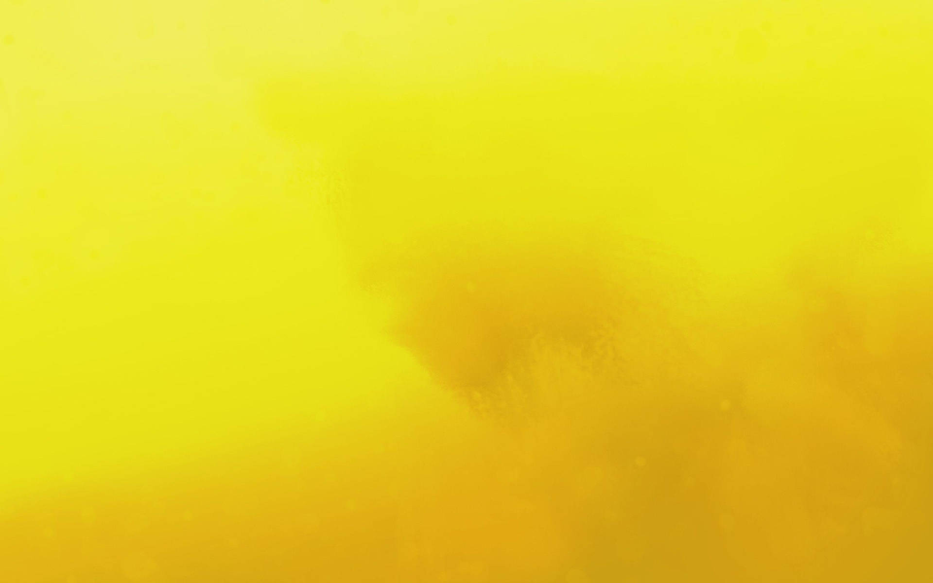 Unfondo Amarillo Con Una Persona En El Centro Fondo de pantalla