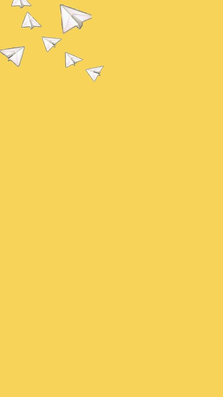 Fondosde Pantalla Para Teléfonos Con Estética Amarilla De Aviones De Papel. Fondo de pantalla